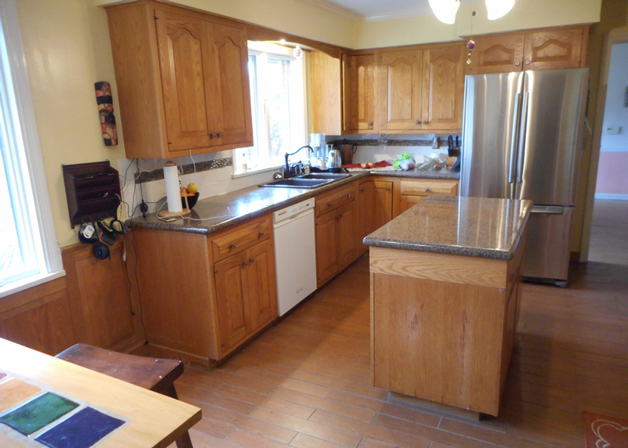 Kitchen cabinetry, granite tile top
