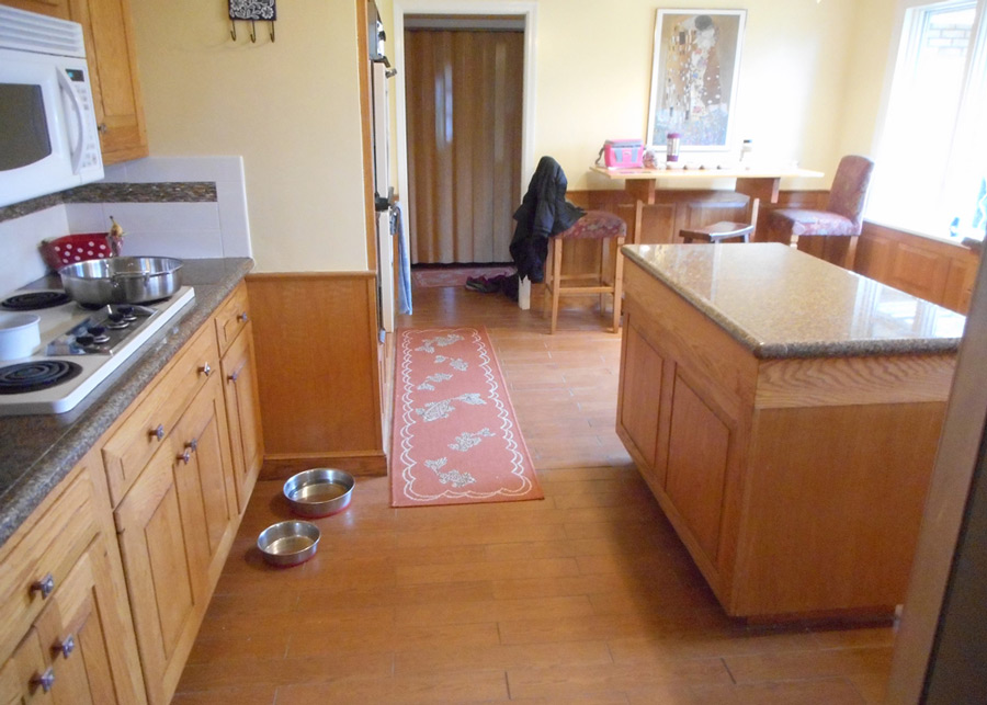 Kitchen cabinetry, granite tile top