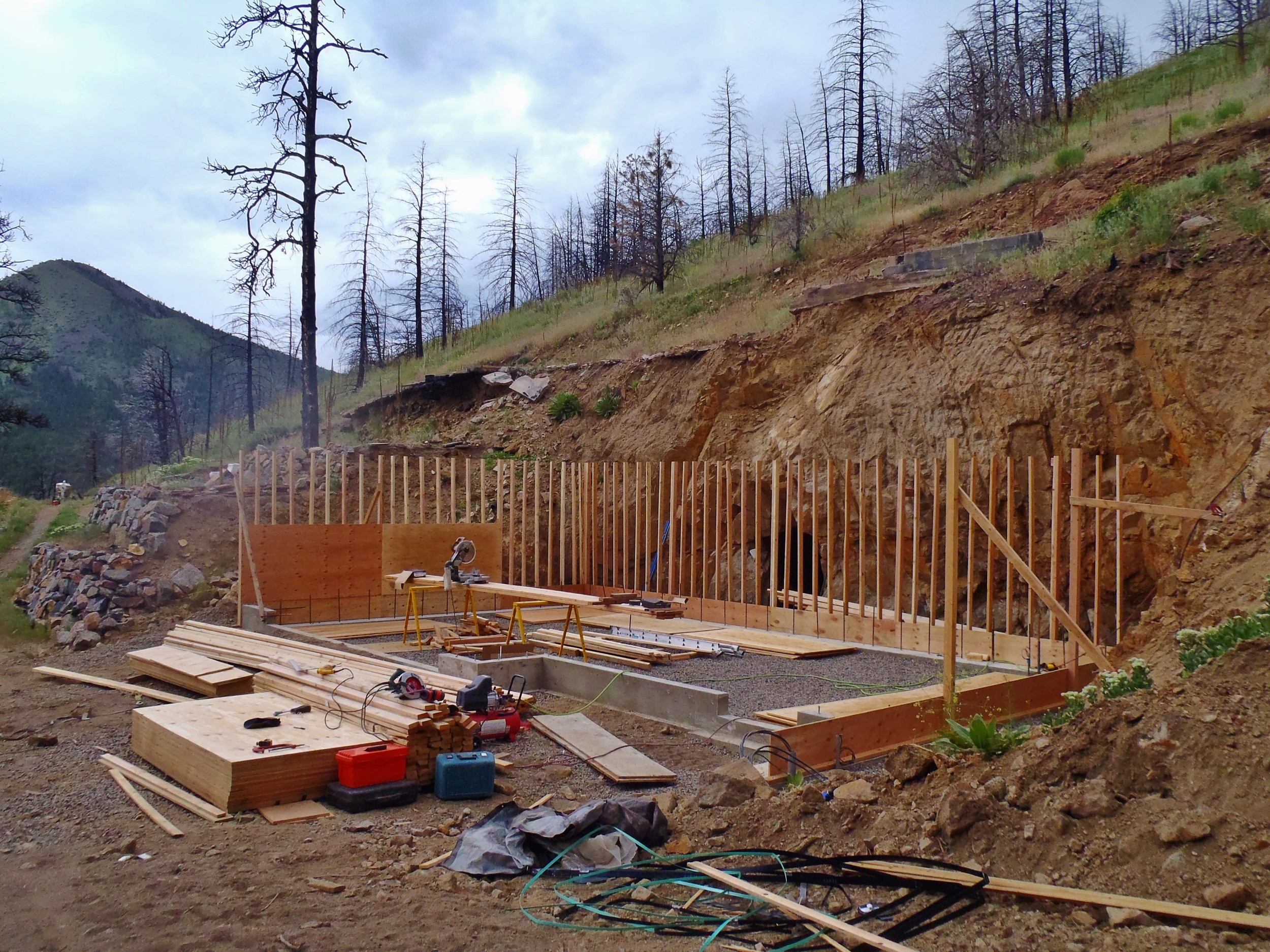 New foundation (there is a mine behind the house)