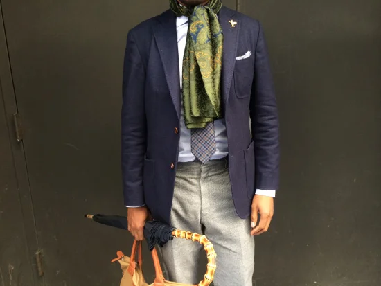 Jacket by Hardy Amies, shirt by Kamakura, tie and trousers by Brioni, 'Land of the Hummingbirds' pin by By Elias, umbrella by Kent Wang, O'Hare tote by Want Les Essentiels de la Vie