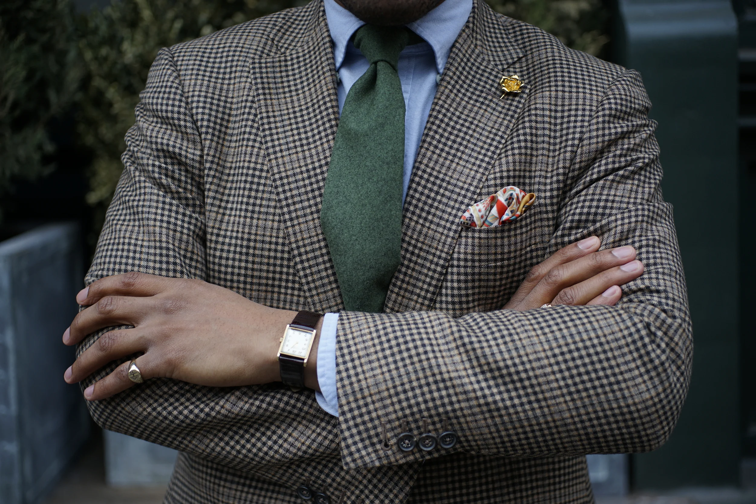 Coat by Isaia, shirt by Kamakura Shirts, Tie by Josiah France, pocket square by Kent Wang lapel pin by By Elias,