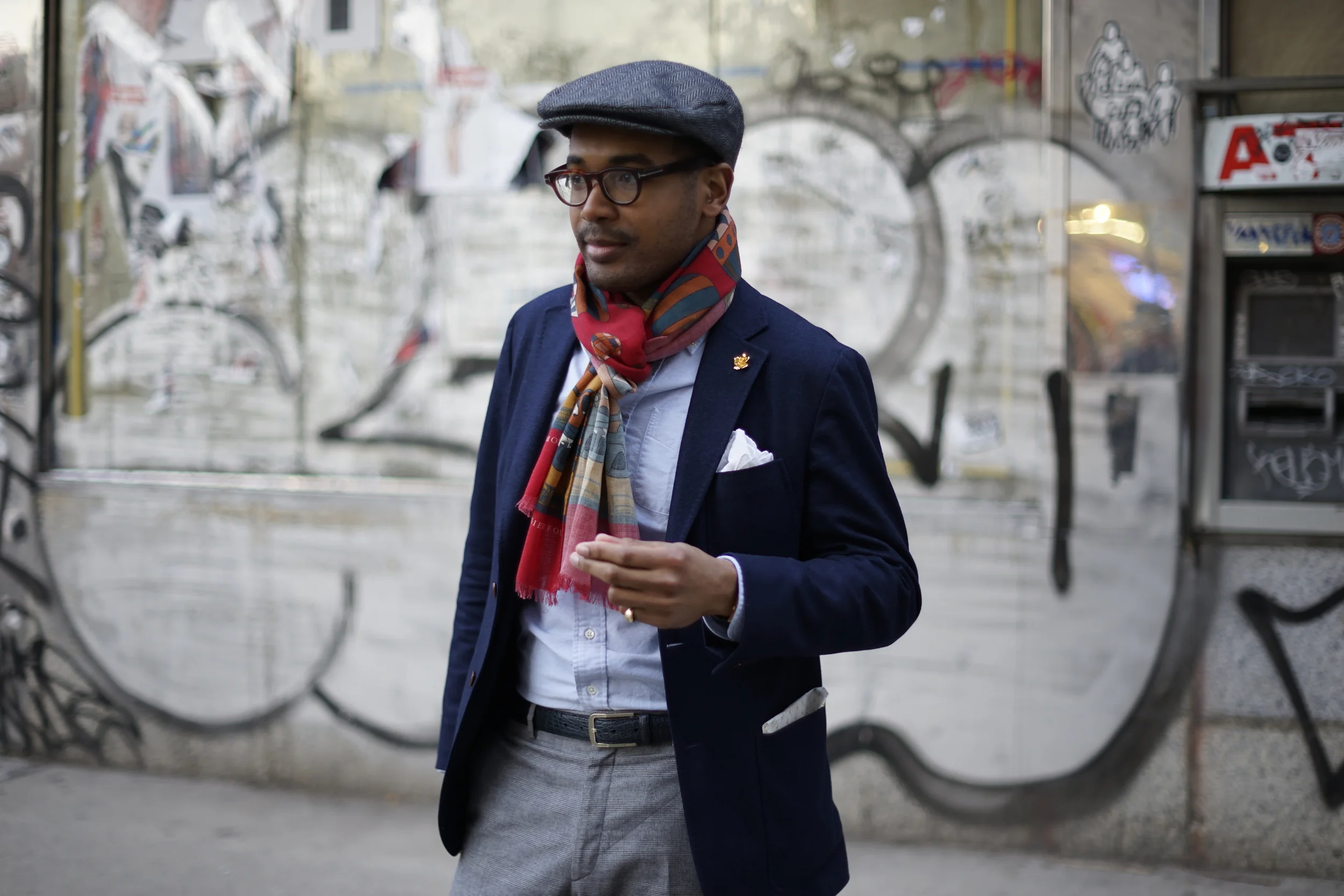 Silk/wool scarf 'Around the World' scarf by Monsieur Fox, jacket from Hardy Amies, Shirt from Kamakura Shirts, frame from Tom Ford, trousers from Brioni, lapel pin from By Elias