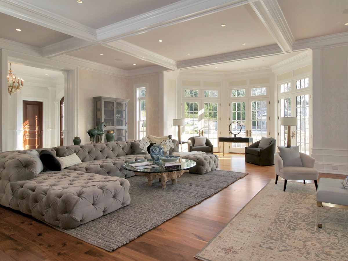 the-focal-point-of-the-living-room-is-this-large-low-back-sofa-and-coffee-table-and-a-small-area-near-the-fireplace.jpg
