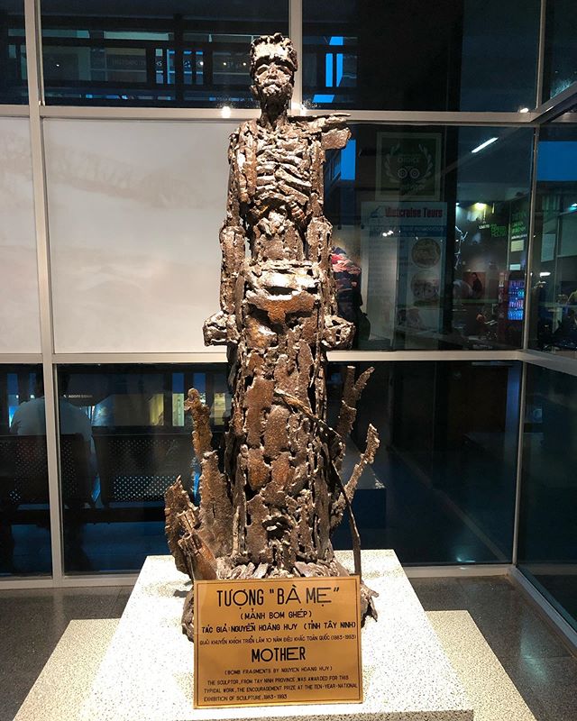 &lsquo;Mother&rsquo; sculpture made of bomb fragments. Somber and educational visit to Vietnam War Remnants Museum