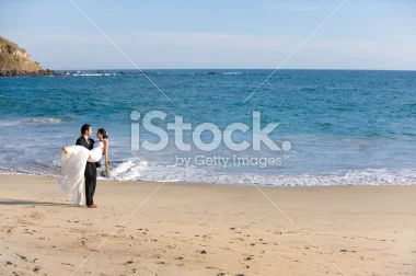 stock-photo-8948836-beautiful-couple-by-the-beach.jpg