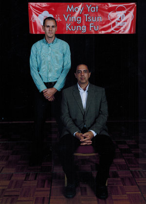Sifu Brad Schonhorst (left) with his Sifu, Sigung Moy Yat Tung (seated).