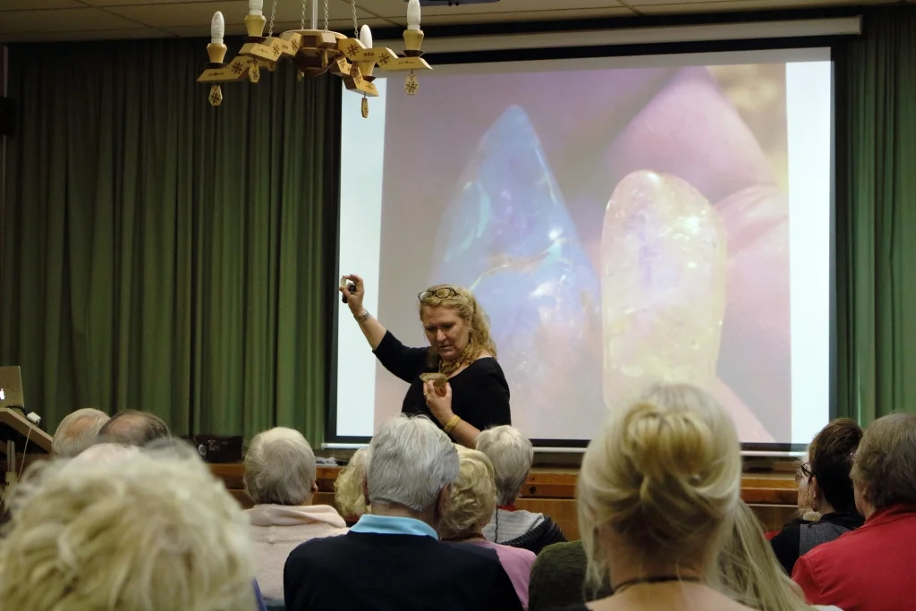 Talking about how to distinguish real amber from fake at Latvian House in Sydney.