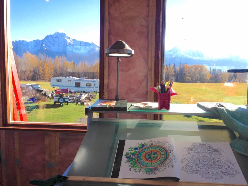 Michelle Greene Hotchkiss My little studio my husband built for me. It's not finished yet but I love it. It's too hot with all the windows in the summer - which is fine because I would rather be sitting below outside. It's perfect in the Alaska winters, it has a propane furnace and is well insulated. Studio upstairs, outdoor lounge area downstairs. It now has all windows and door.