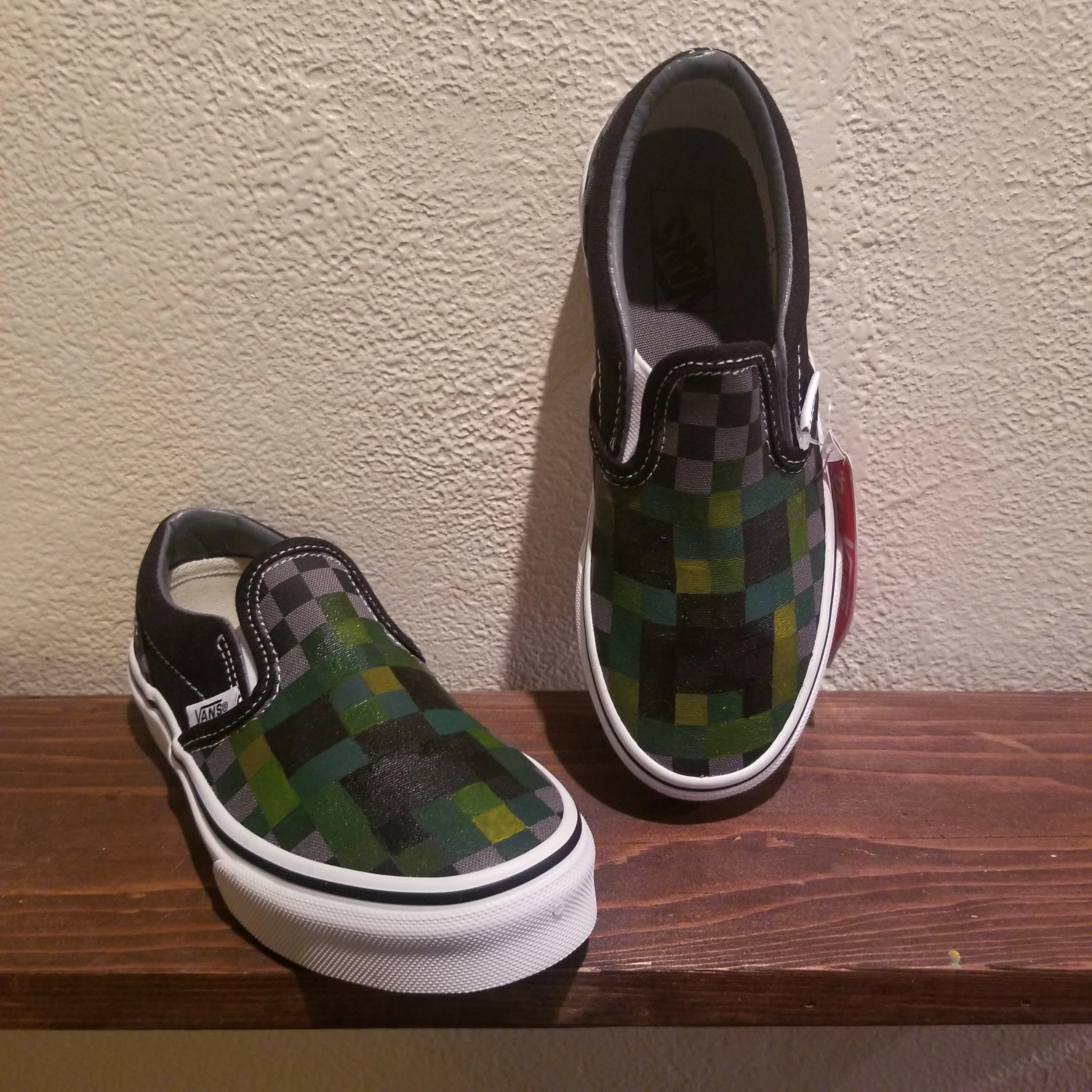 A pair of Minecraft-inspired Vans I painted for my nephew’s b-day, 2019.