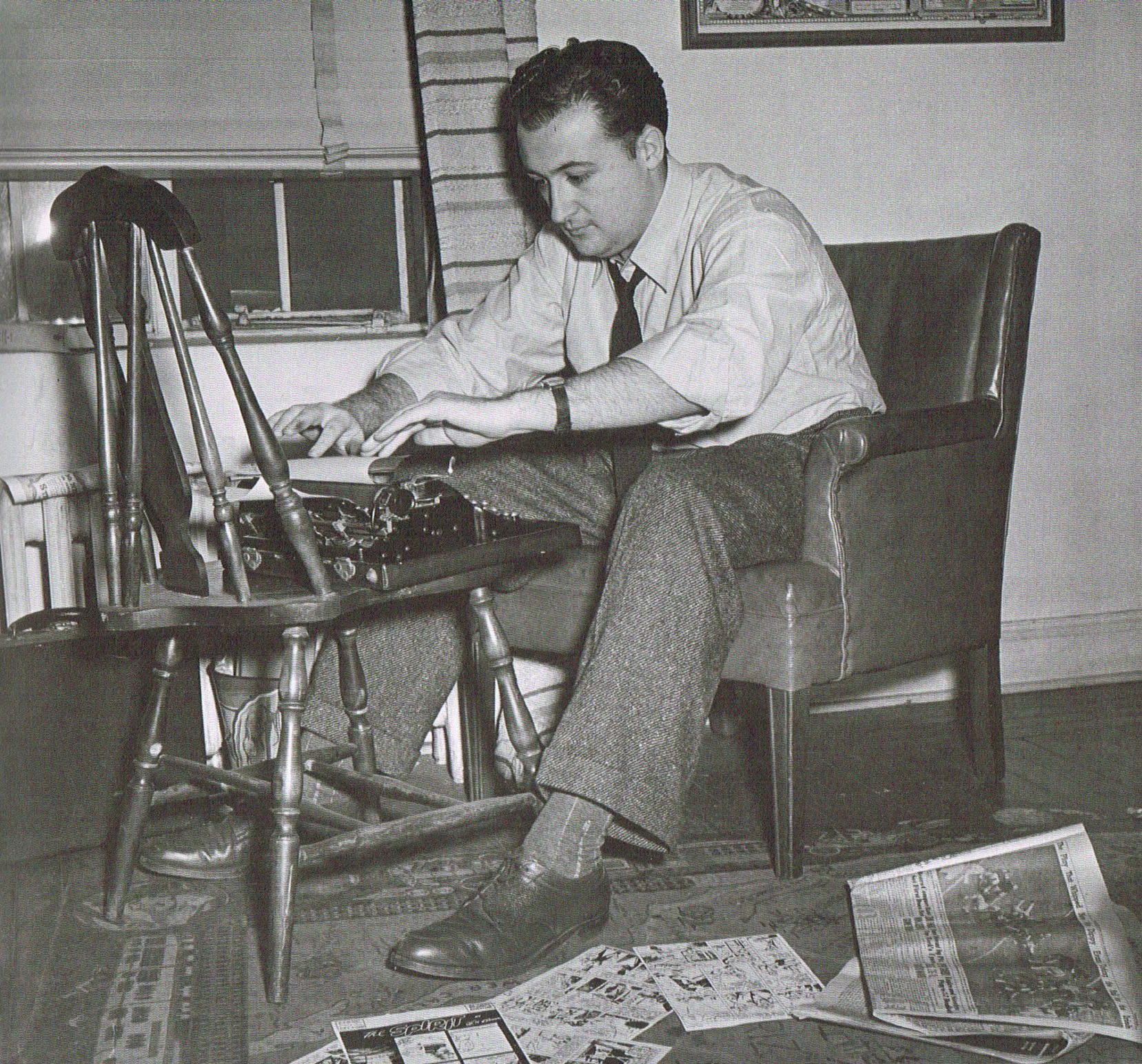 will eisner champion of the graphic novel,will eisner comic art,the spirit comic,photo of will eisner writing on a type writer 1941