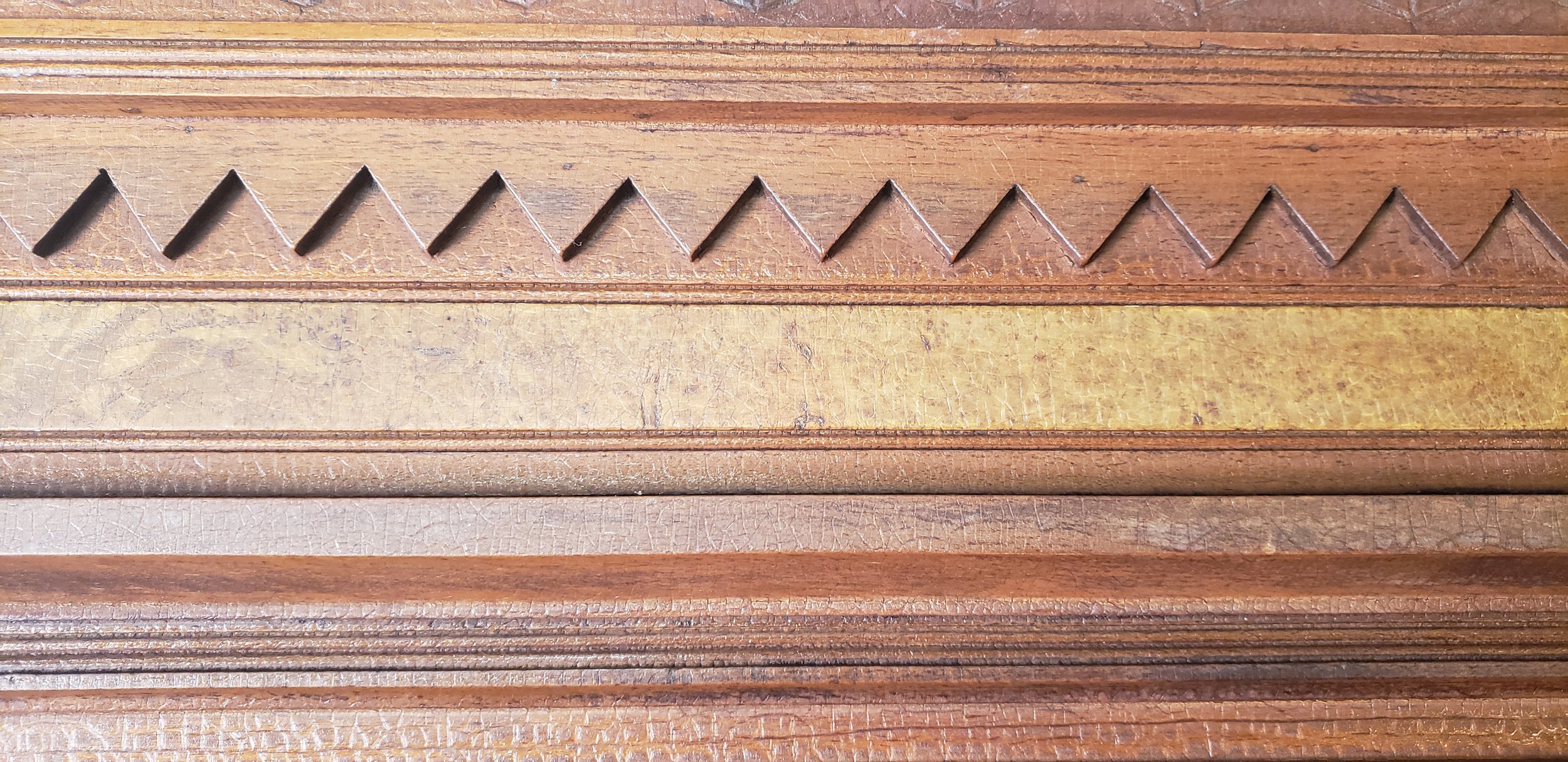 wood carving on dresser, wave pattern on dresser