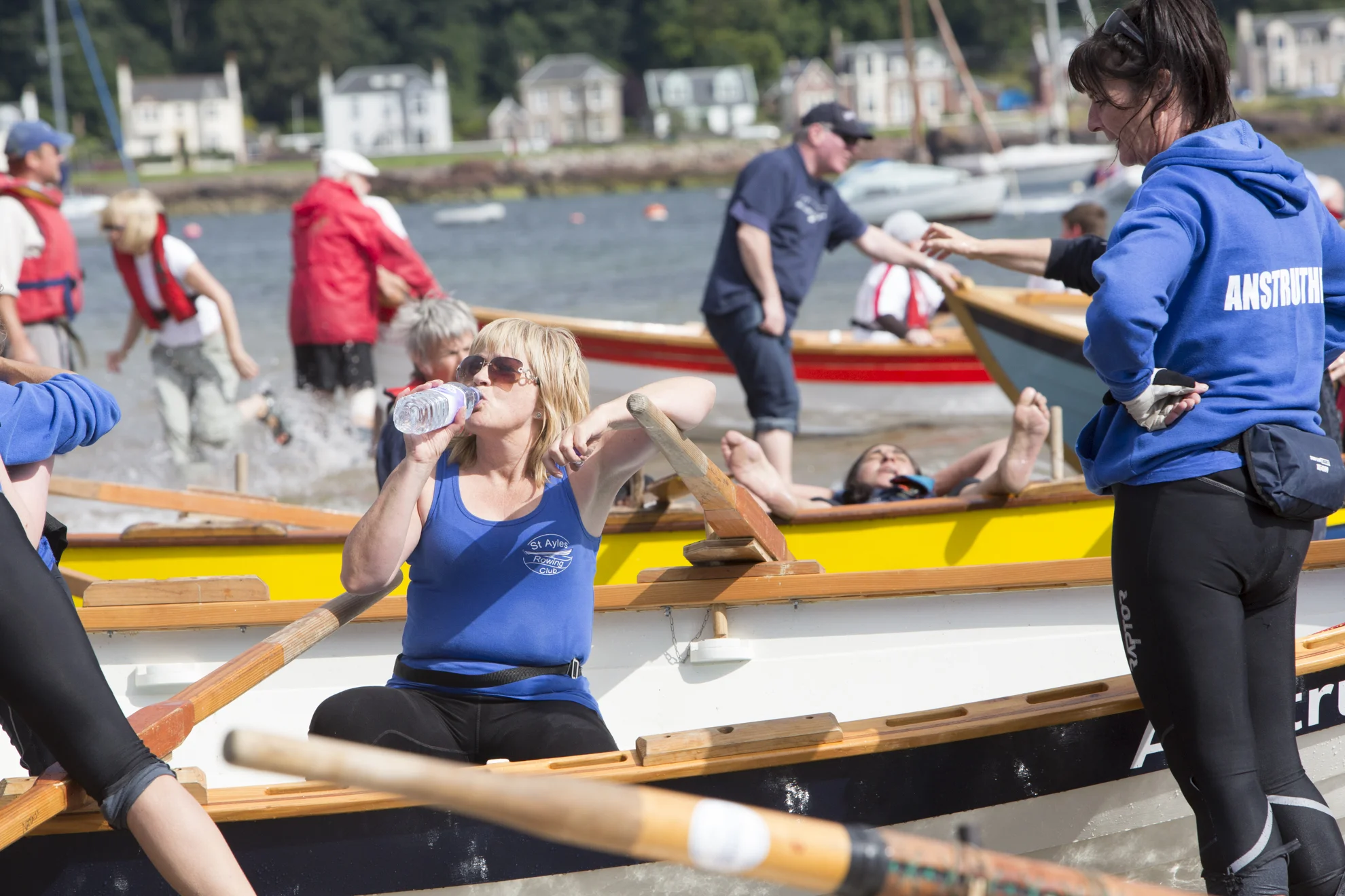 Elsie Johnstone takes a rest with her Anstruther teammates after competing in the long race of the Sail and Oar event on Cumbrae.