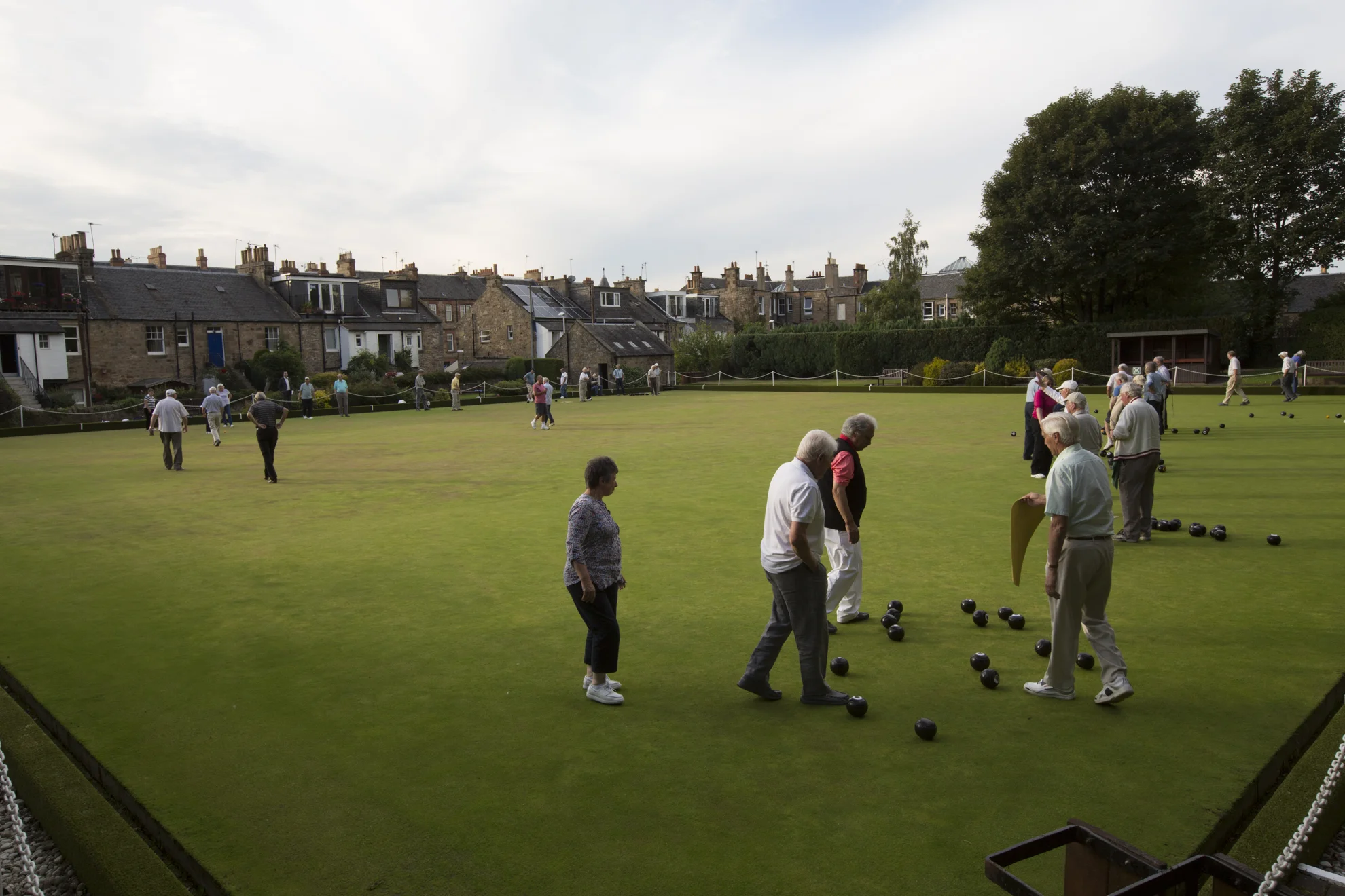 Members of the Blackhall Bowling Club participate in the weekly Monday evening hat night at the lawn bowling club in Edinburgh.