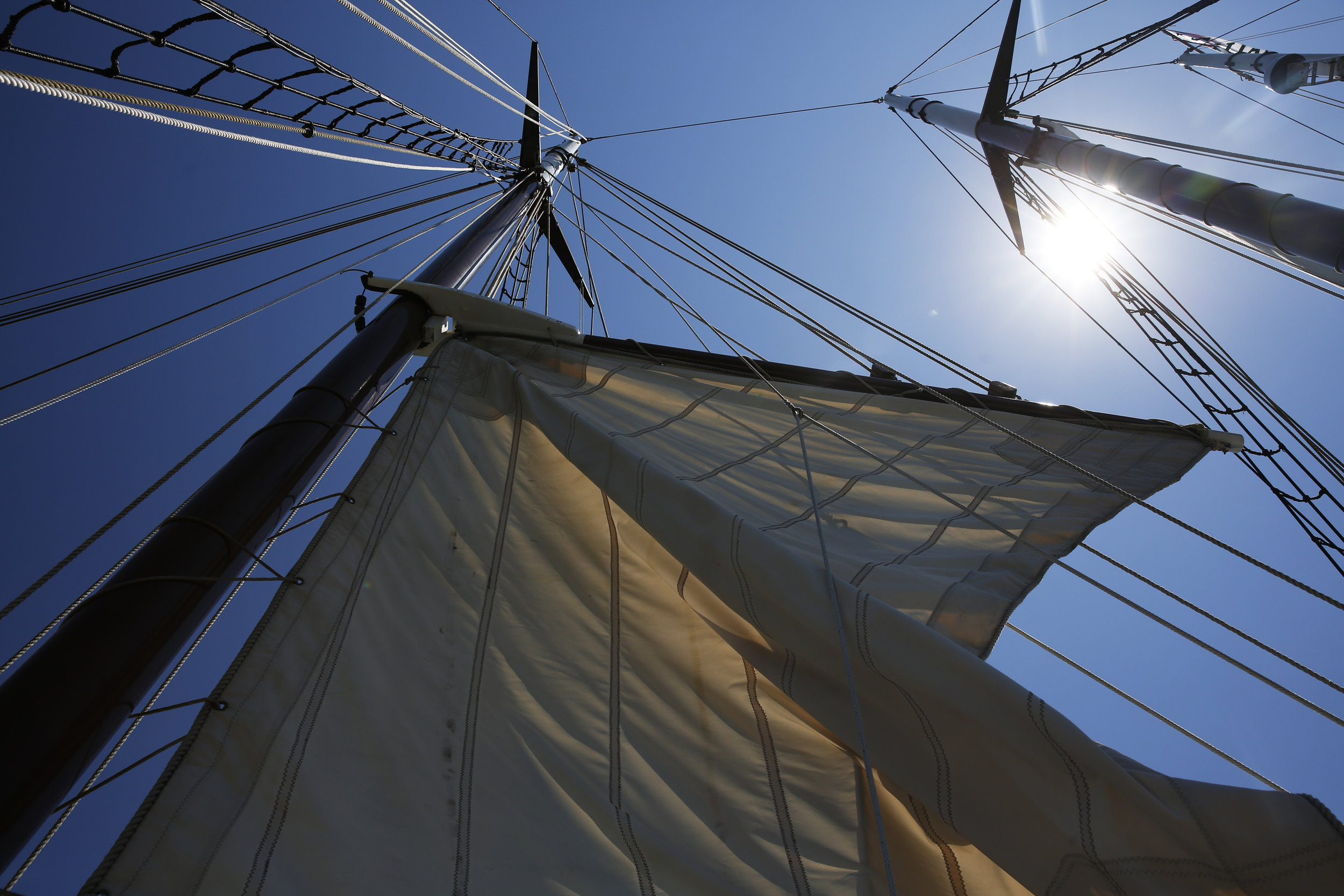  Crew and passengers on the Alliance raise the mast on the schooner Wednesday, June 29, 2016 during Yorktown Sailing Charters' pirate cruise.Copyright: The Daily Press 