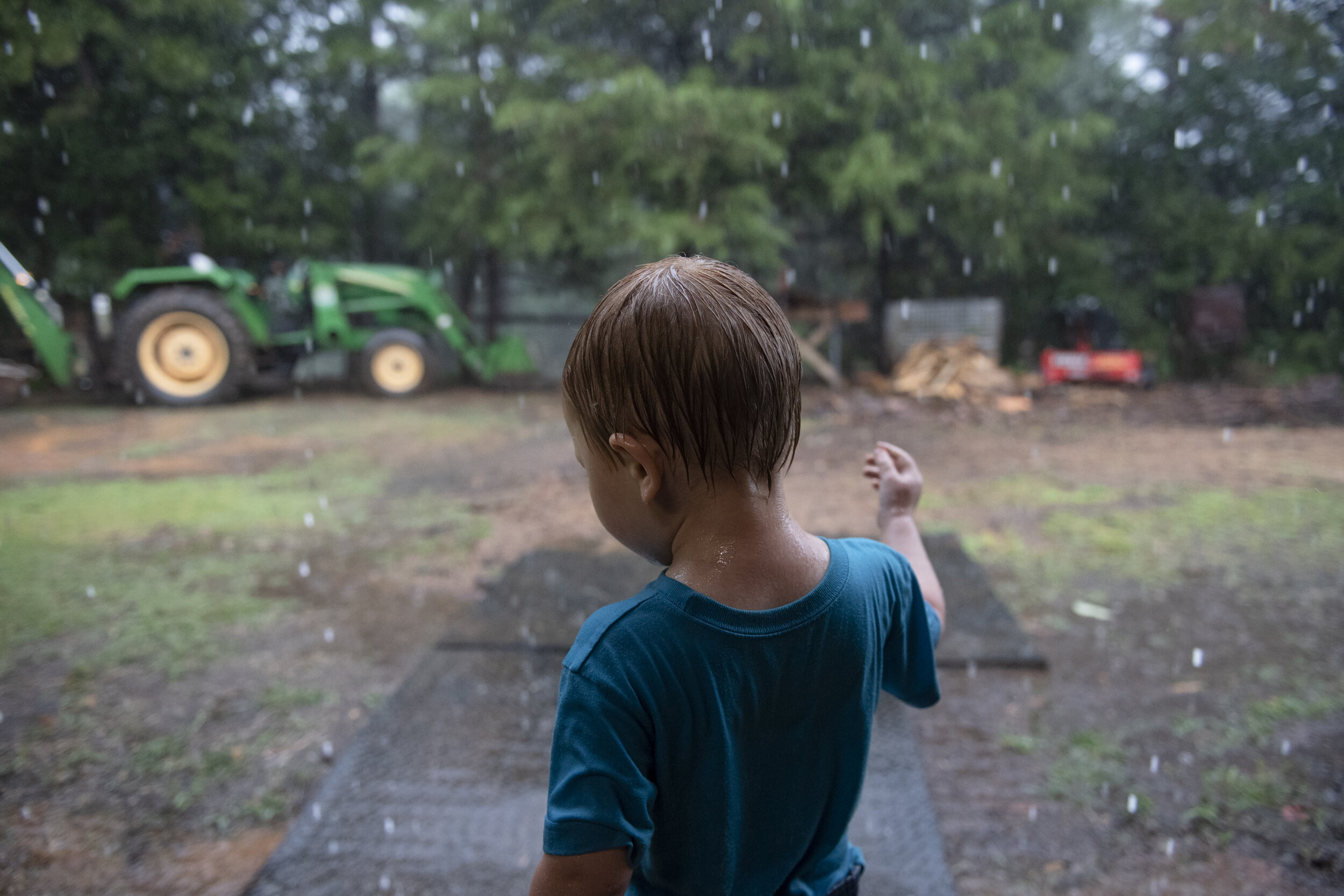  Jace Maddox, 2, watches the rain at Possum Kingdom Kreamery during the 2019 Upstate Farm Tour Saturday, June 8, 2019. Maddox was there with his family volunteering at the event. (The Greenville News) 