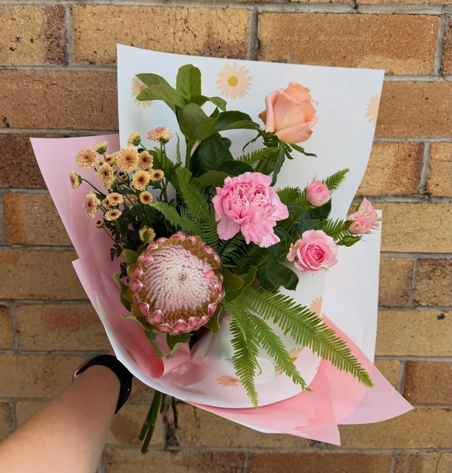 Happy Tuesday Flower Lovers 💐
We hope you had a wonderful long weekend. 

This week&rsquo;s posy is a beautiful Pastel Posy featuring a locally grown Protea Susara, a Rose, Spray Roses, Chrysanthemums, a Carnation, Viburnum and Umbrella Fern Foliage