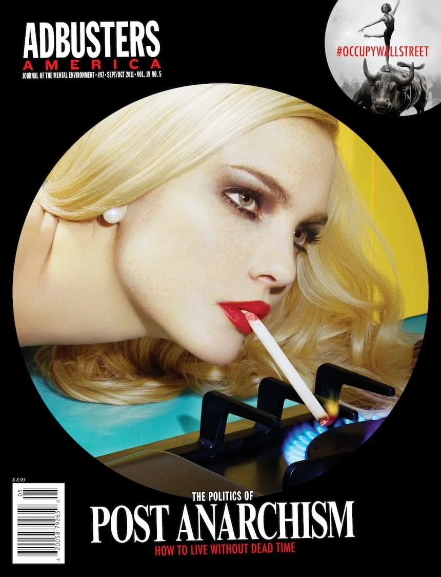 A woman with blonde hair and red lipstick lights a cigarette on a stove burner. The scene conveys a rebellious, edgy tone on the "Adbusters" cover.