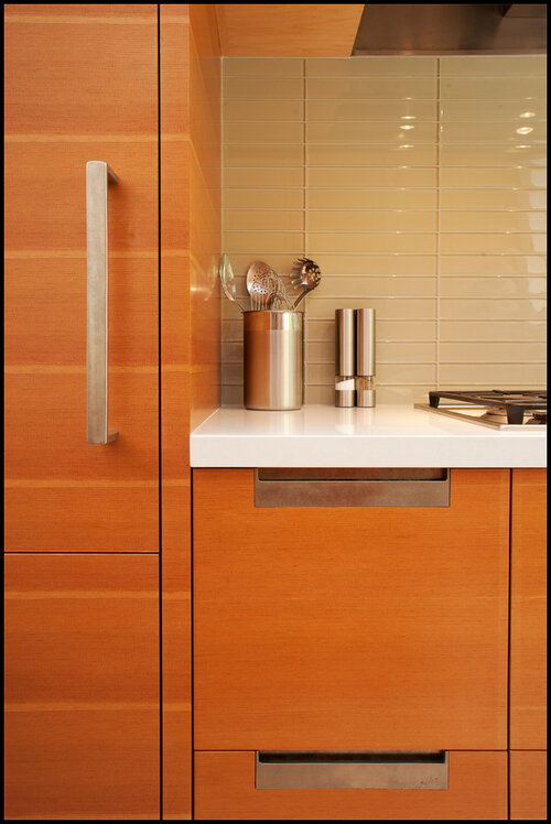  FEP-210 cabinet pulls paired with GH-990 appliance pull in W1 finish&nbsp; 