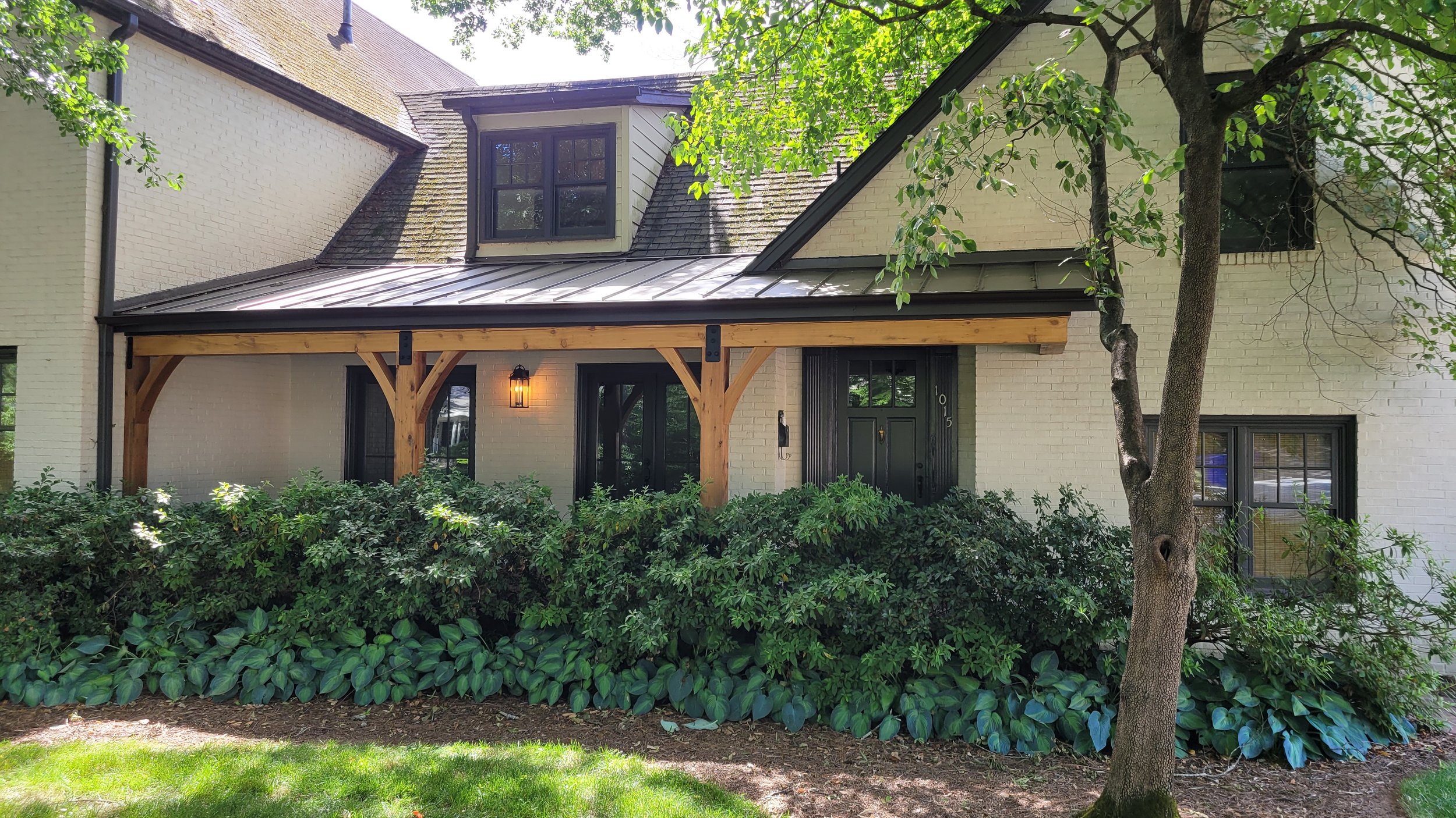  Two new French doors open from the new dining room onto the new covered front patio 