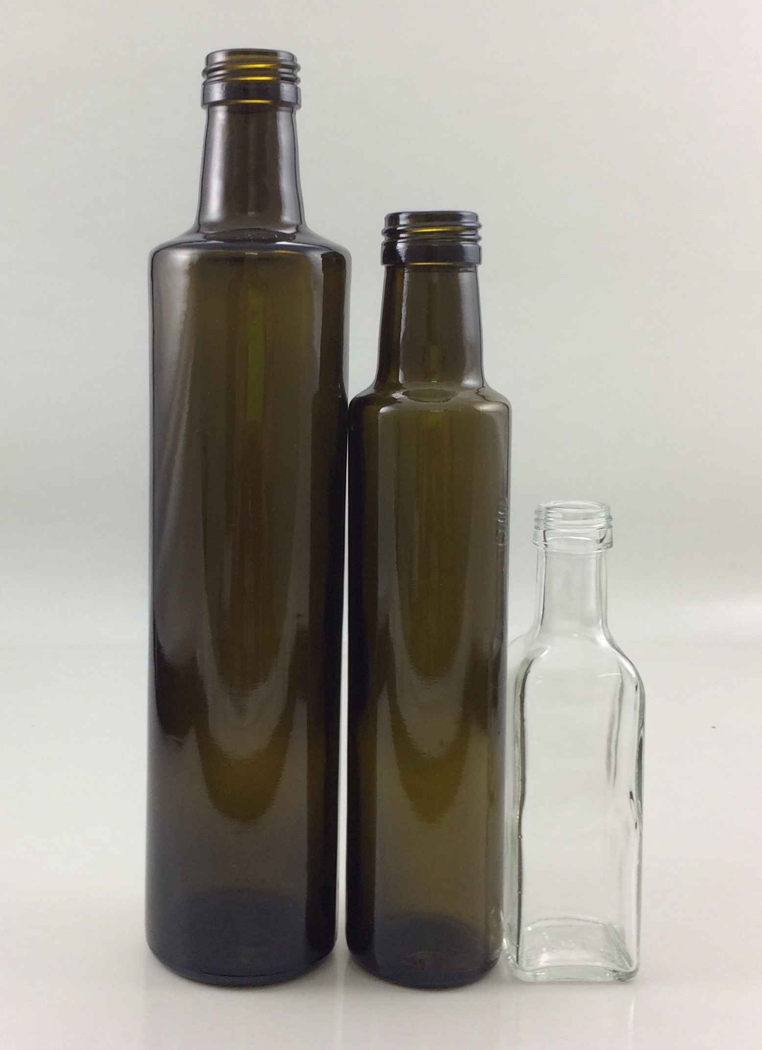 3 olive oil bottles.jpg
