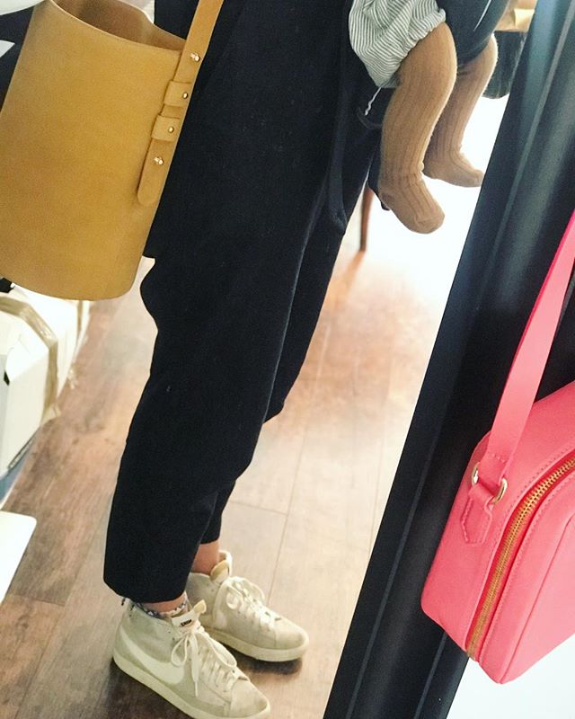 Kids and bags and sneaks. Essentials.