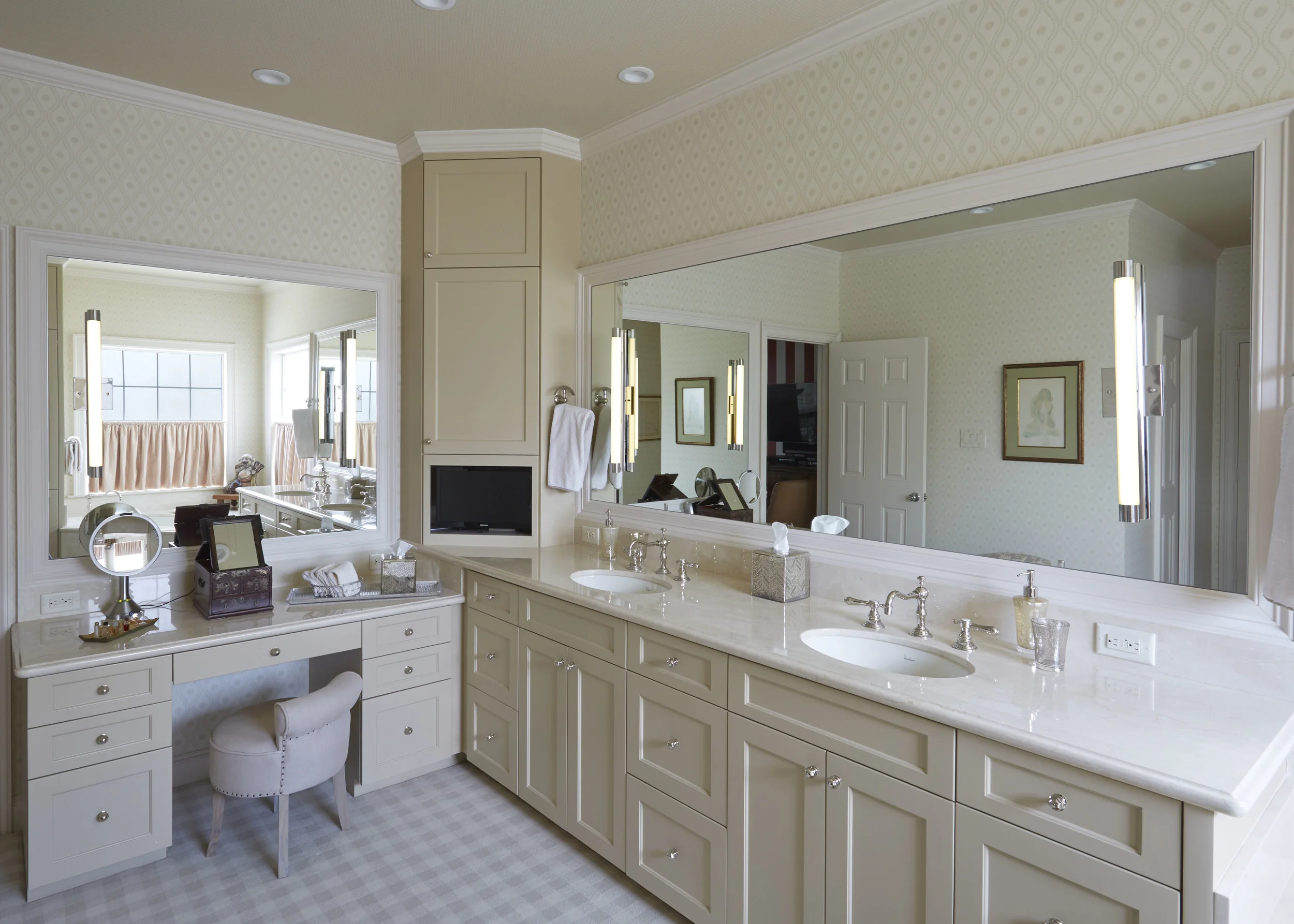 Transitional Beautiful transitional bathroom features painted shaker door fronts.