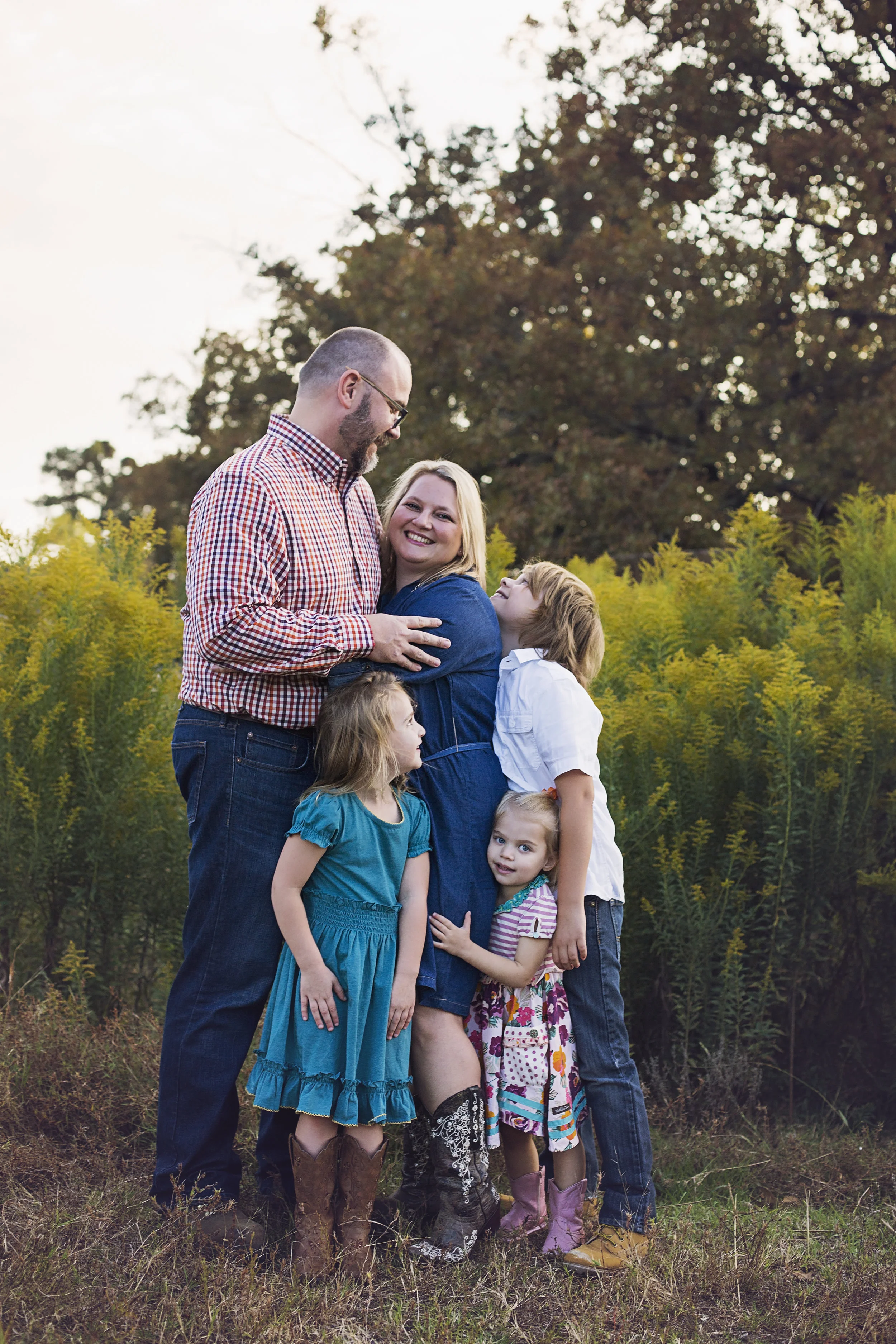"This was the first time Lindsey photographed our family and she was amazing! Lindsey is professional, easy to work with and great with kids! We love our photos.....the natural light, warm colors, the setting and especially the precious moments she captured! We will definitely be having more photos taken by Lindsey and we highly recommend her!" - Kathy Wallace