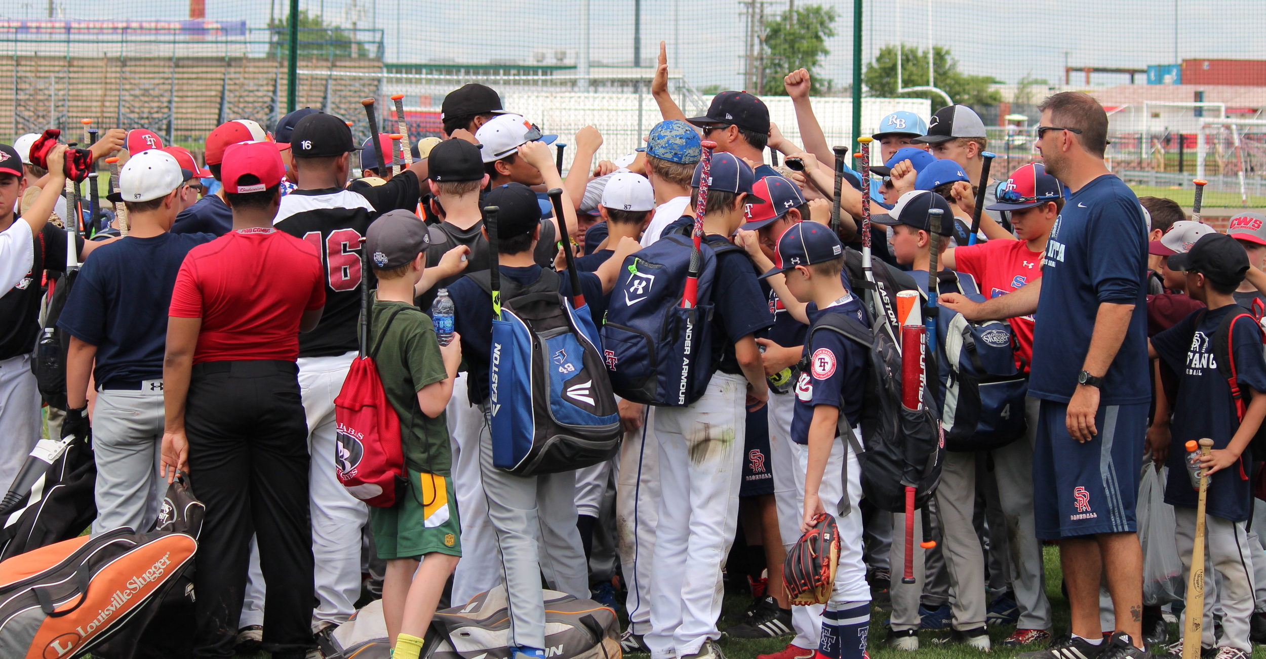Baseball campers get together after a day of strong work 