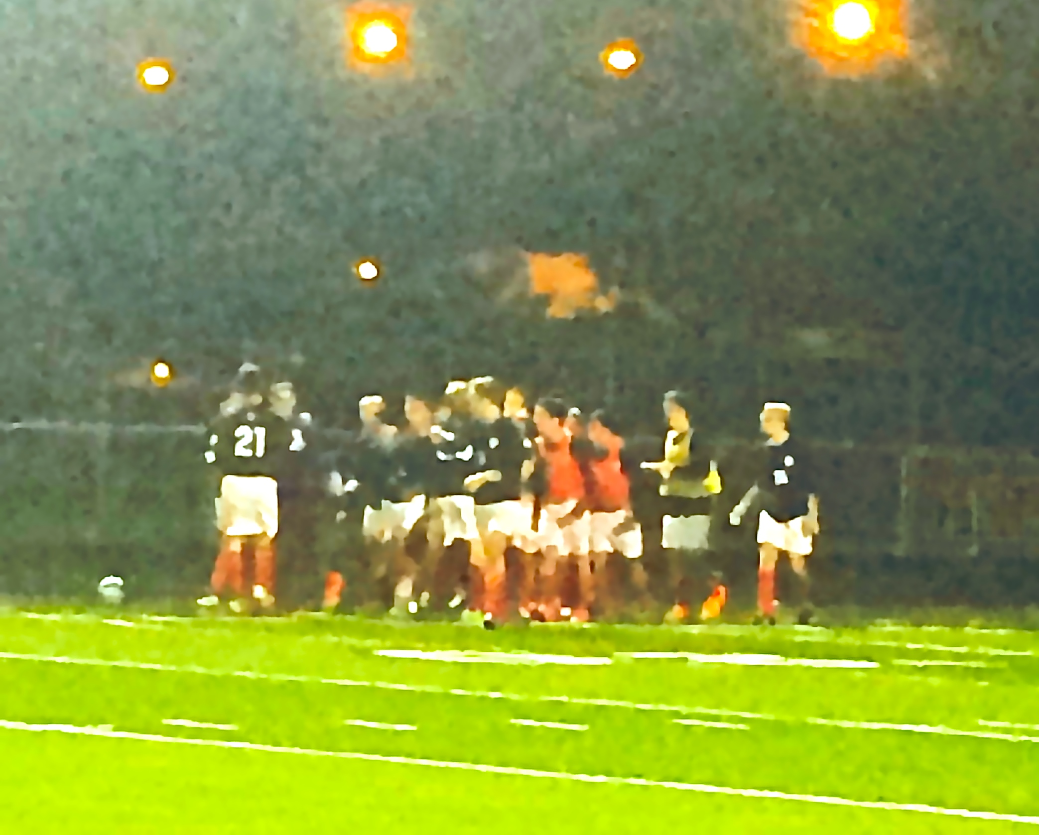 St. Rita Soccer players swarm goalkeeper Mike Long after game-winning save at Doyle Stadium!