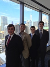 L to R Teddy McDermott, Nick LoMaglio '04, Collin Rook and Connor Healy at the UBS Financial Services office in downtown Chicago.