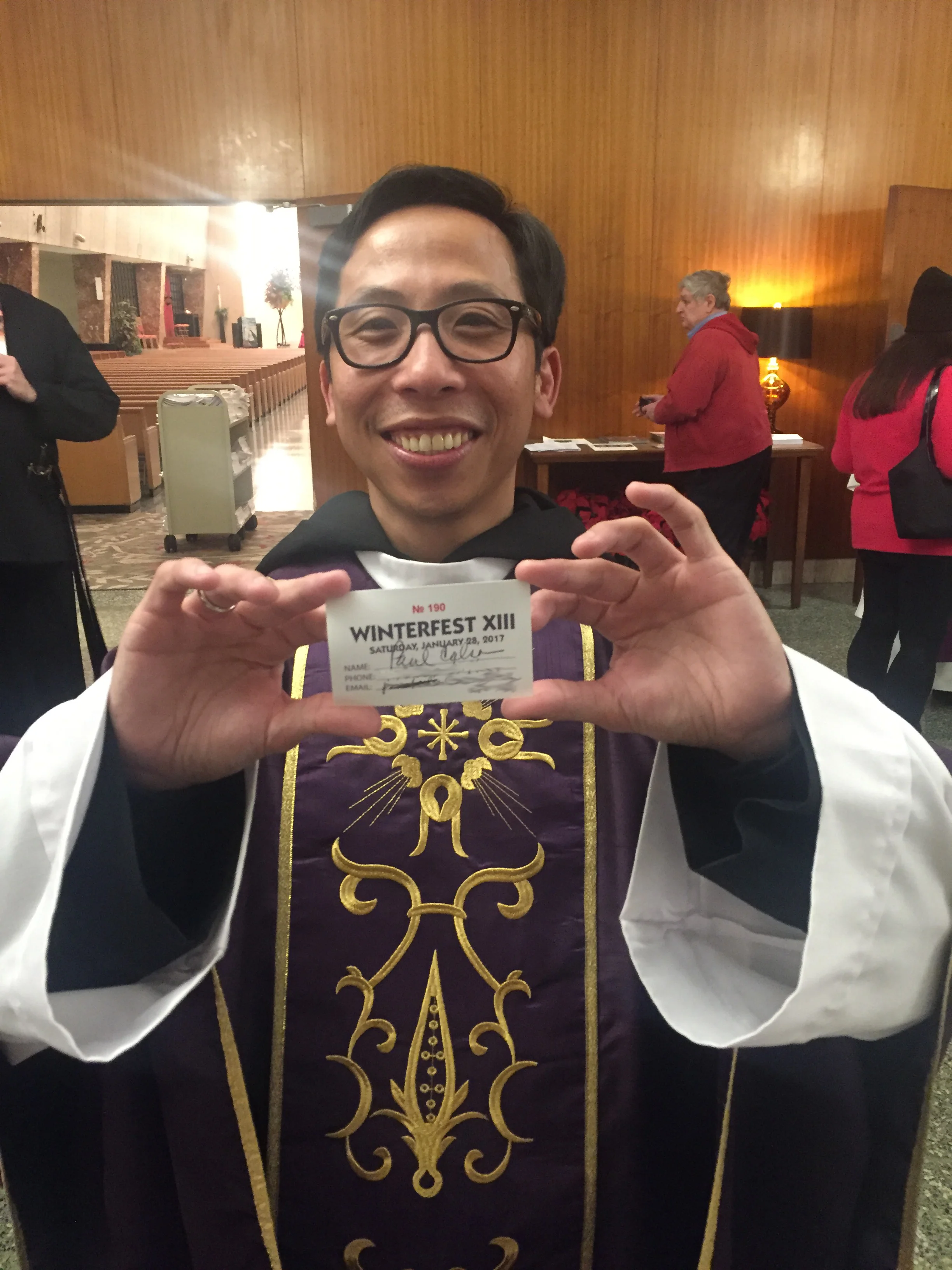 Fr. Richie Mercado with the Winterfest Early-Bird Raffle Winning Ticket