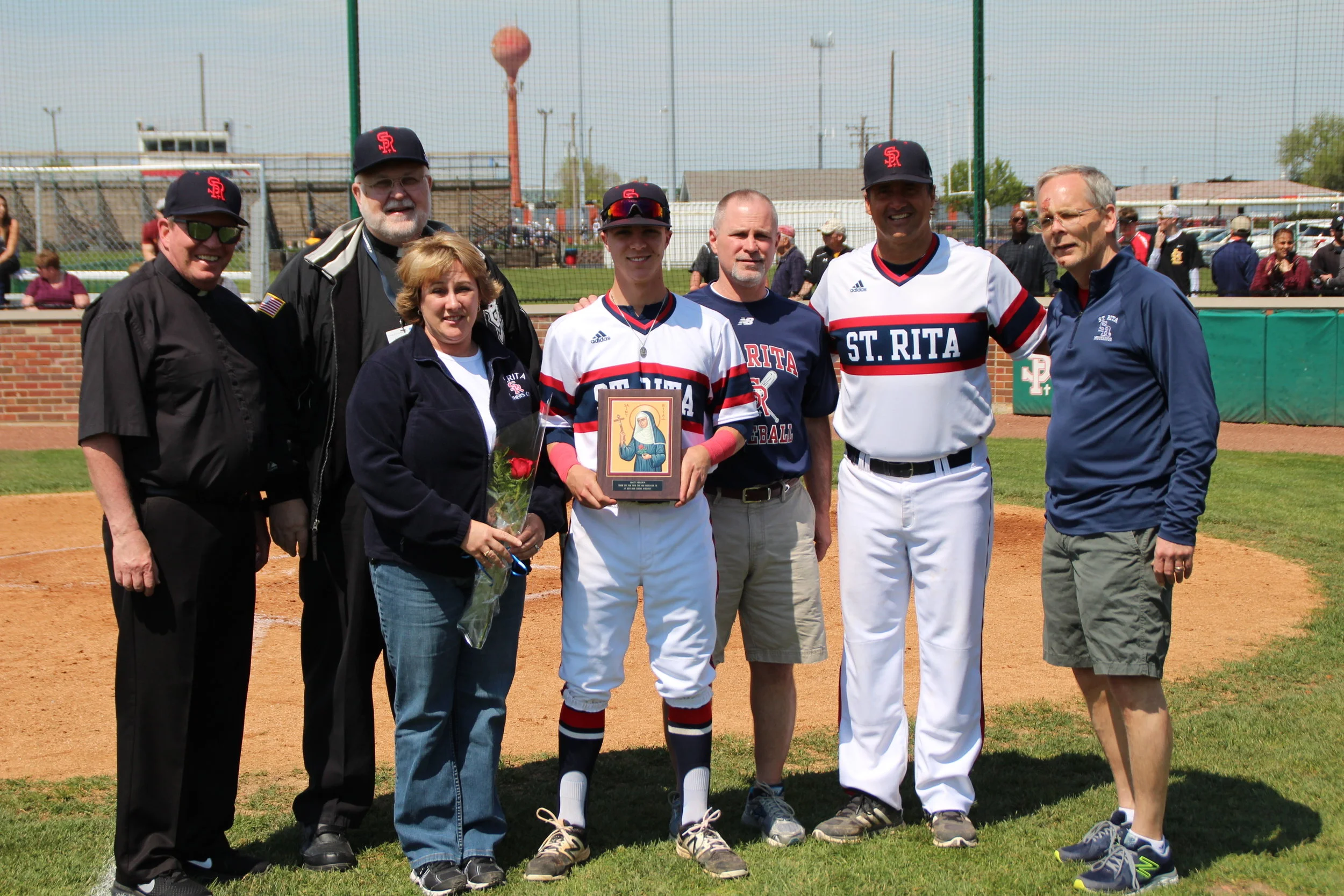 St. Rita senior Matt Verdun (center)