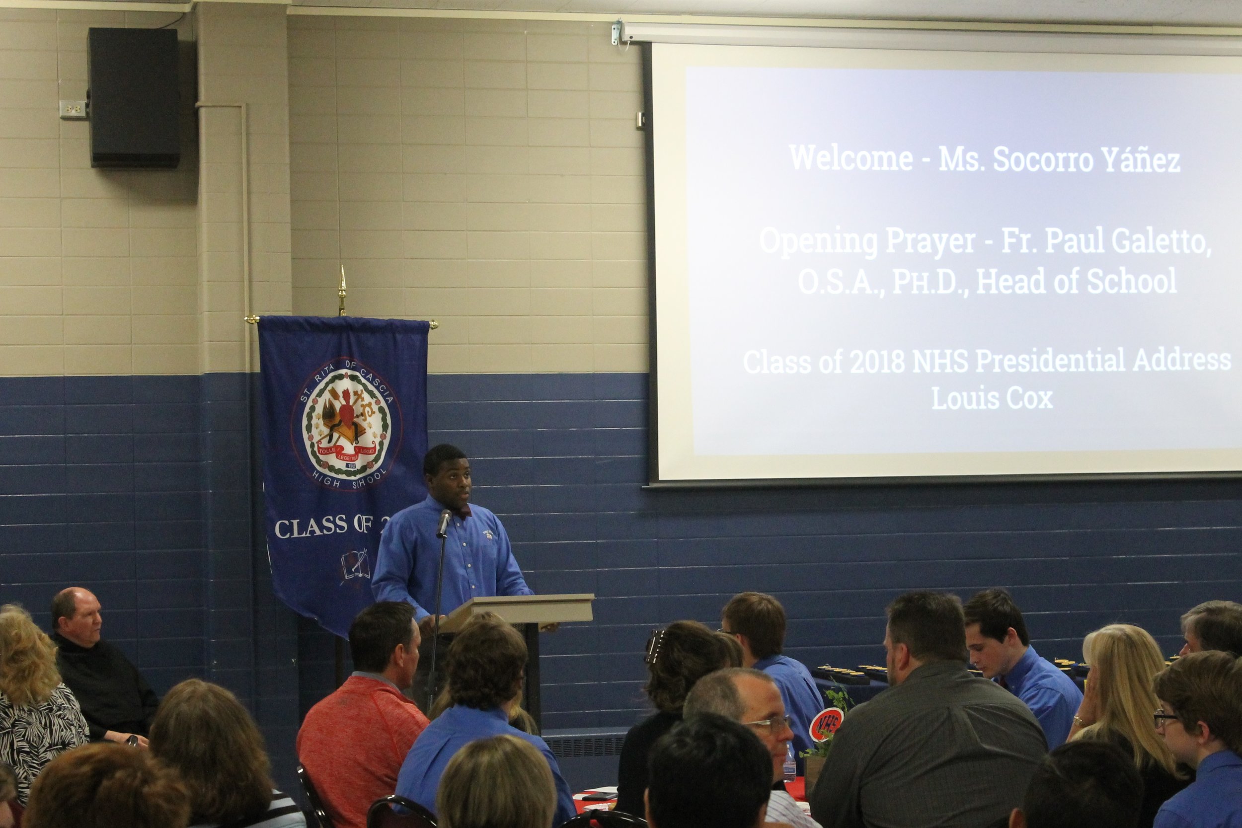 Louis Cox '18 addresses the crowd.