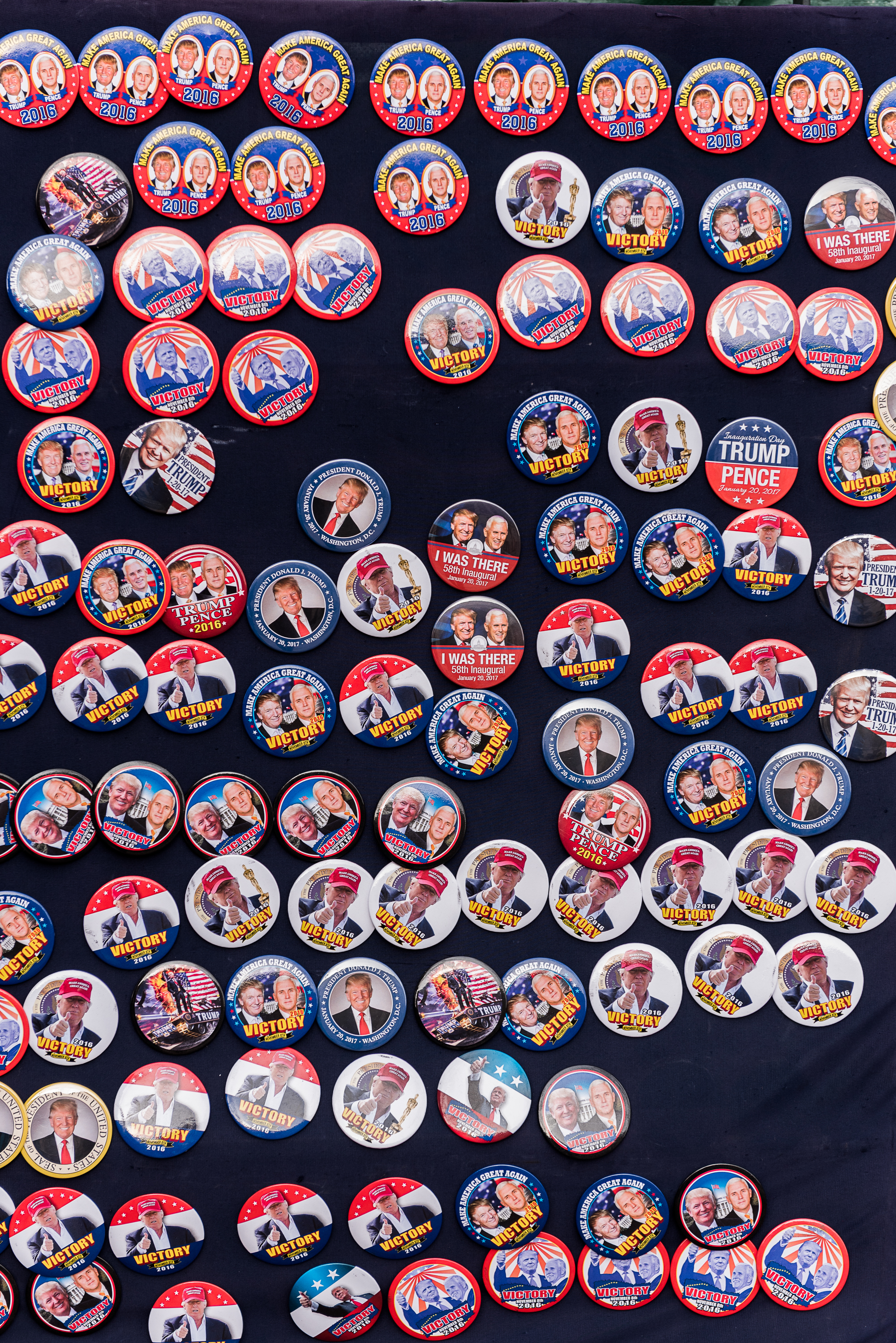 Inauguration buttons sit on display for people to purchase, Thursday, January 19, 2017.