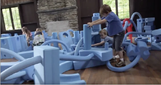 CHILD’S PLAY - From Caragh McLaughlin Lately, I’ve been doing a lot of thinking about the power of play. If you have kids (or paid any attention to Mr. Rogers back in the day), you’ve surely heard the phrase, “play is the work of childhood.” Play is a way for kids to learn how the world works. And, of course, it’s an opportunity to spend time with important people. Often parents hear the request, “Mom/Dad – will you play with me?” I’ve discovered that when I can be truly in the moment playing with my child, I can tap into his imagination and innate creativity. Which in turn gives me an opportunity to look at my world and my work in new and different ways. I recently discovered Imagination Playground’s Big Blue Blocks, which I think exemplifies that opportunity to unlock creativity in kids, and I have to admit I want to play with them, too.