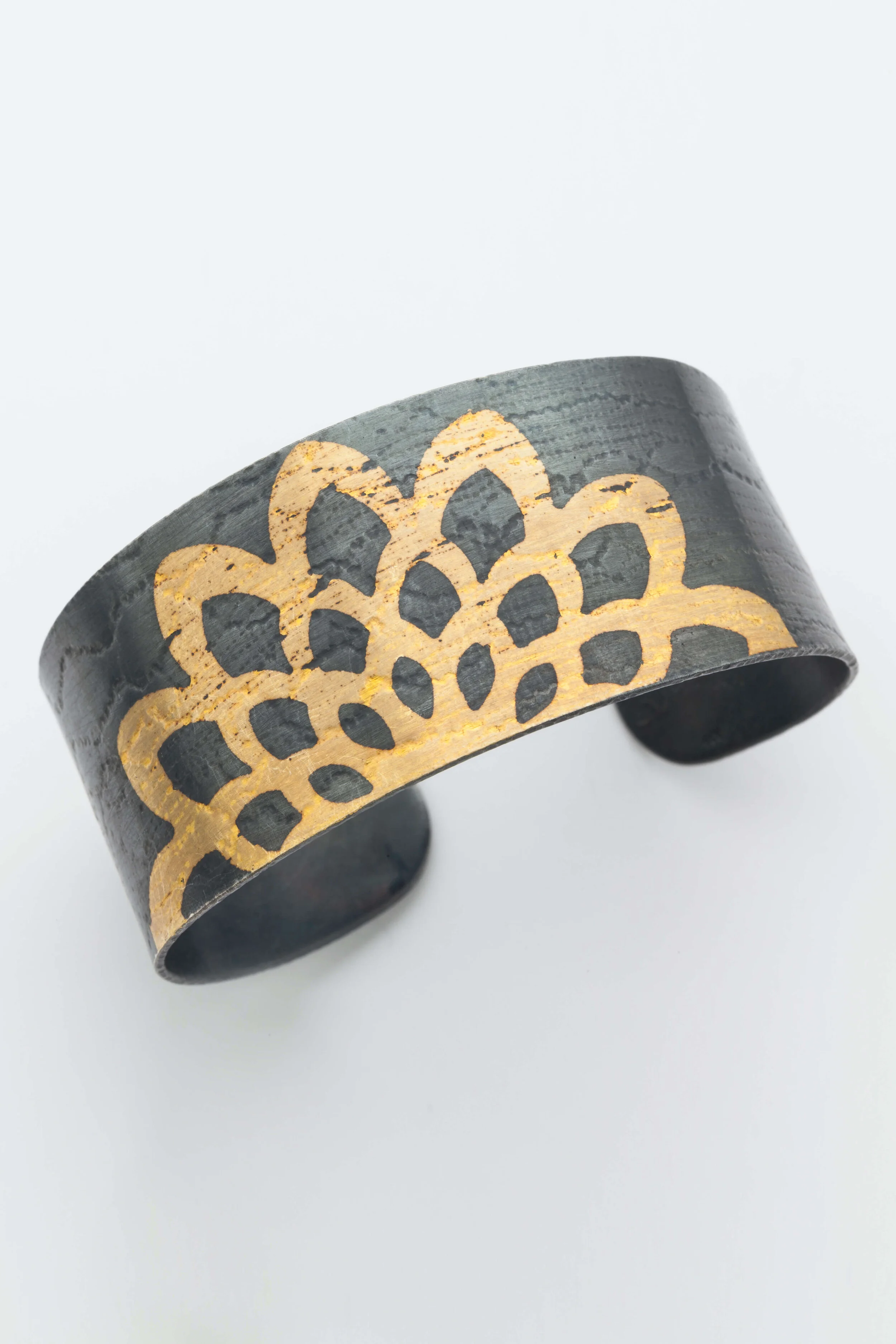 Oxidized Cuff with Gold Sun Pattern
