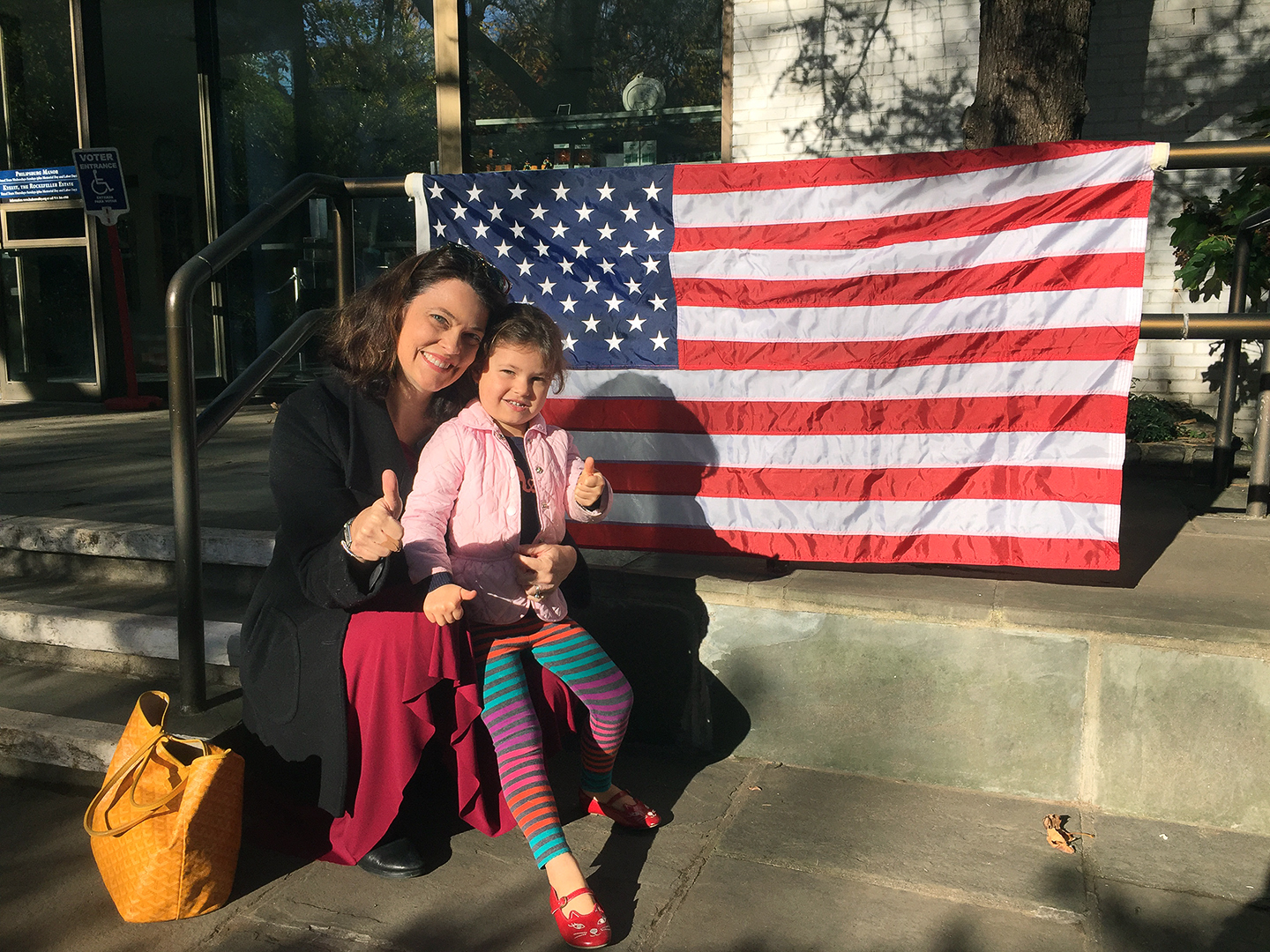 "What pride I felt to be able to vote for a WOMAN with my 3 1/2-year-old daughter, Emery. God bless America! May Hillary's example continue to inspire the younger generation of strong women." ––Christine Ritzen, Producer, CBS News, New York, NY