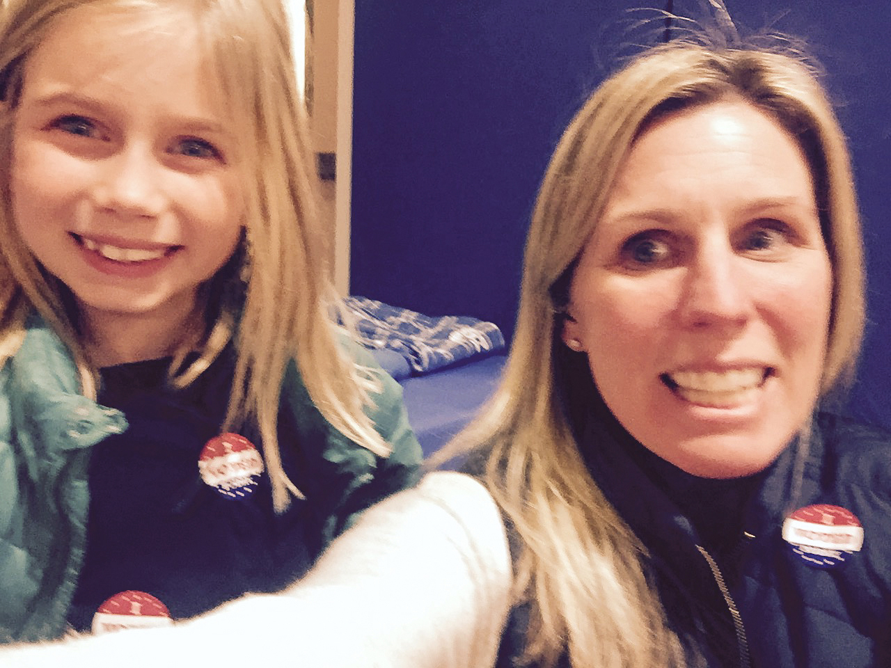 "I left work early so that I could get home and have both of my daughters Maddie Winn (9) and Parker Elizabeth (7) vote with me. It felt so exciting and empowering to walk into our local voting location hand in hand with my two amazing girls thinking we could be making history tonight." - Victoria Shonkoff, Marketing Executive, Boston, MA
