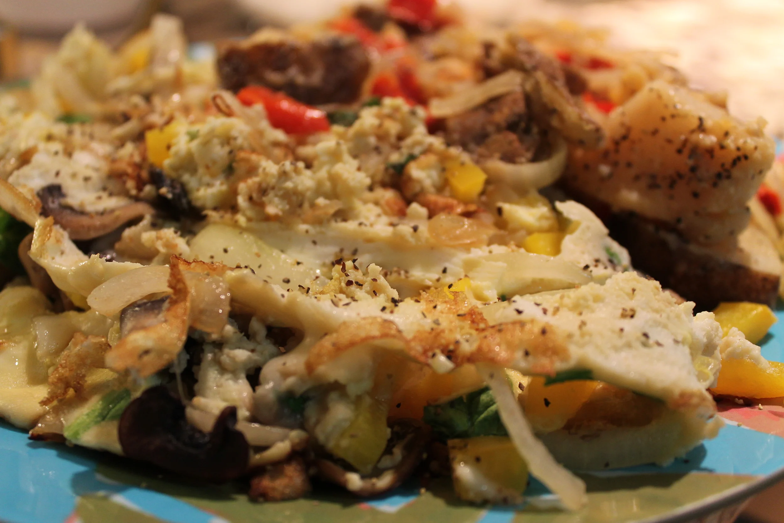 This here is 5 egg whites, spinach, onions, yellow peppers, mushrooms, and provolone cheese with a side of healthy home fries (half a potato, onions, and red peppers) Ate the whole thing! So good!