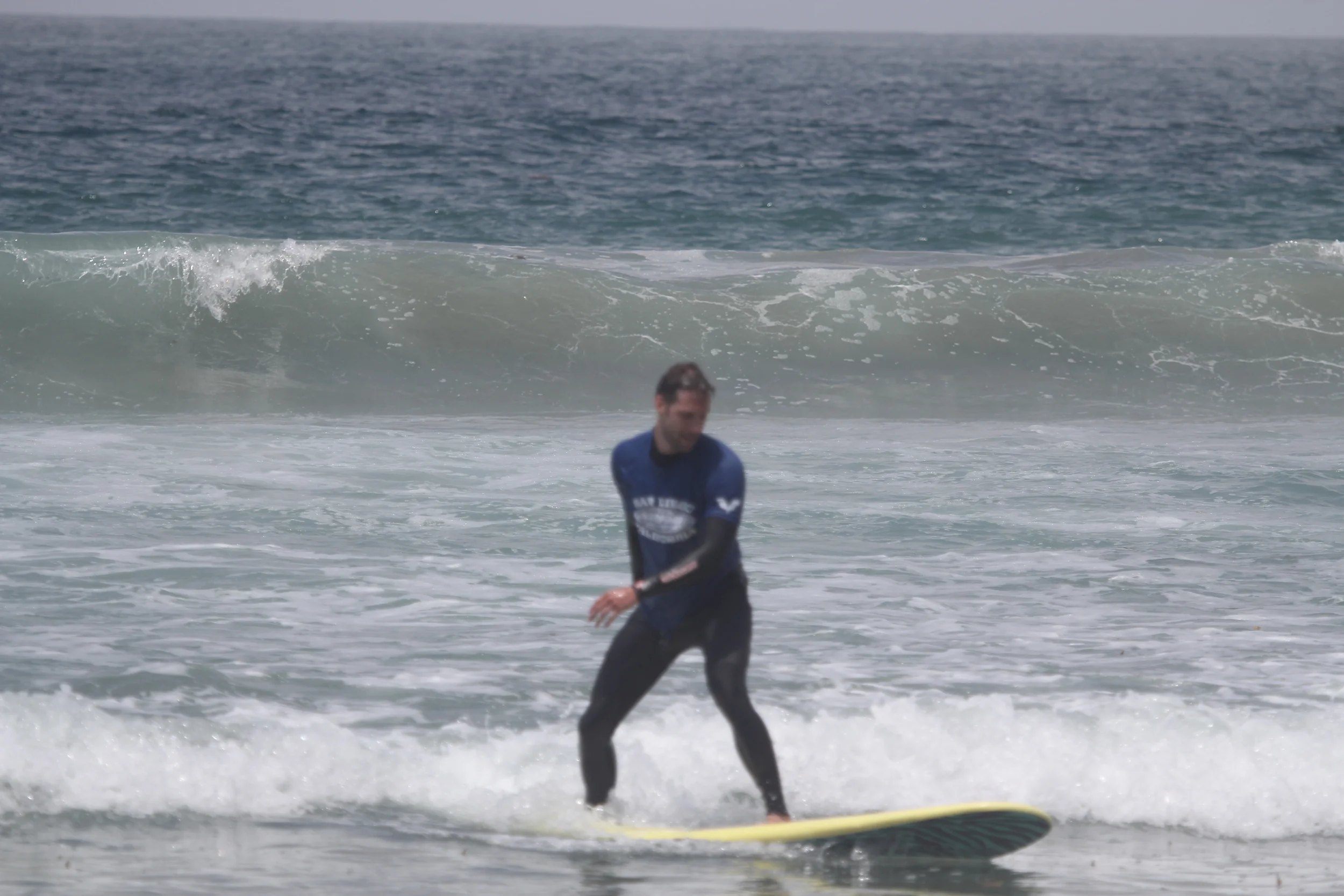 Surfing! Now, you don't need to do this to stay active! The beach is PRETTY LONG....just start walking down it!! 
