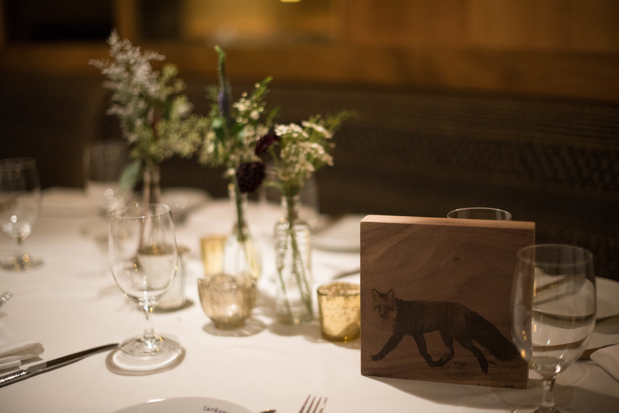 Instead of table numbers, guest sat at table animals. These were handmade by a close friend of T&G's. 