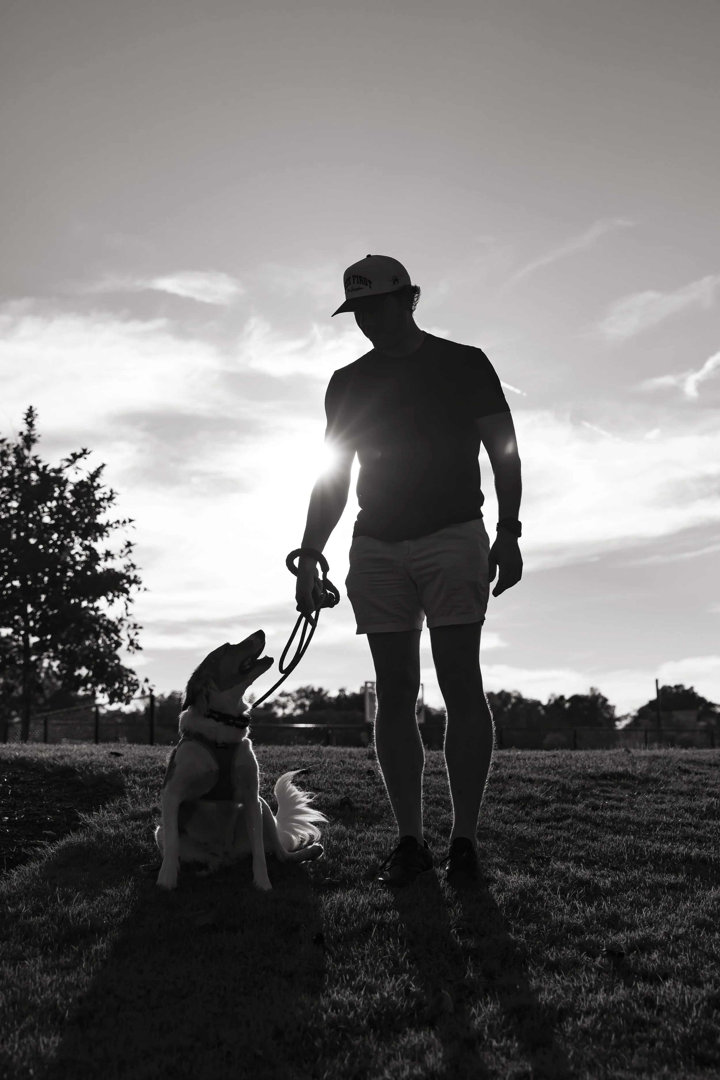 dog and dad at park in greenville, sc unity bark by melissa glynn