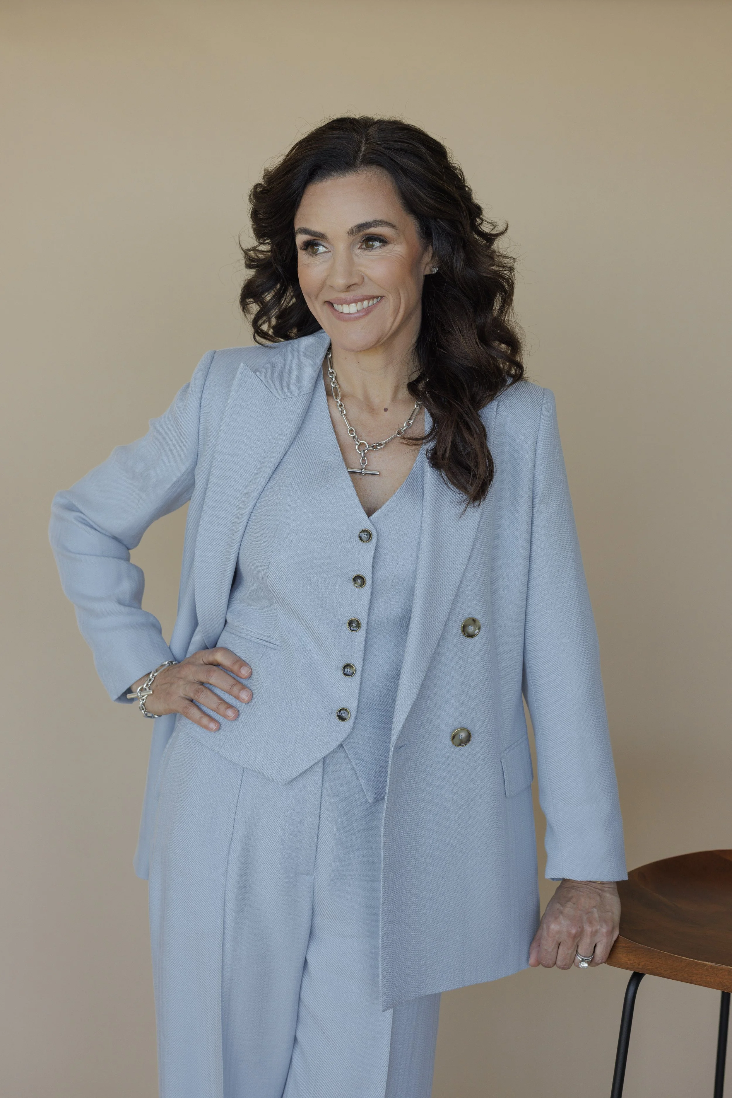 Woman in power suit for her headshots by Melissa Glynn