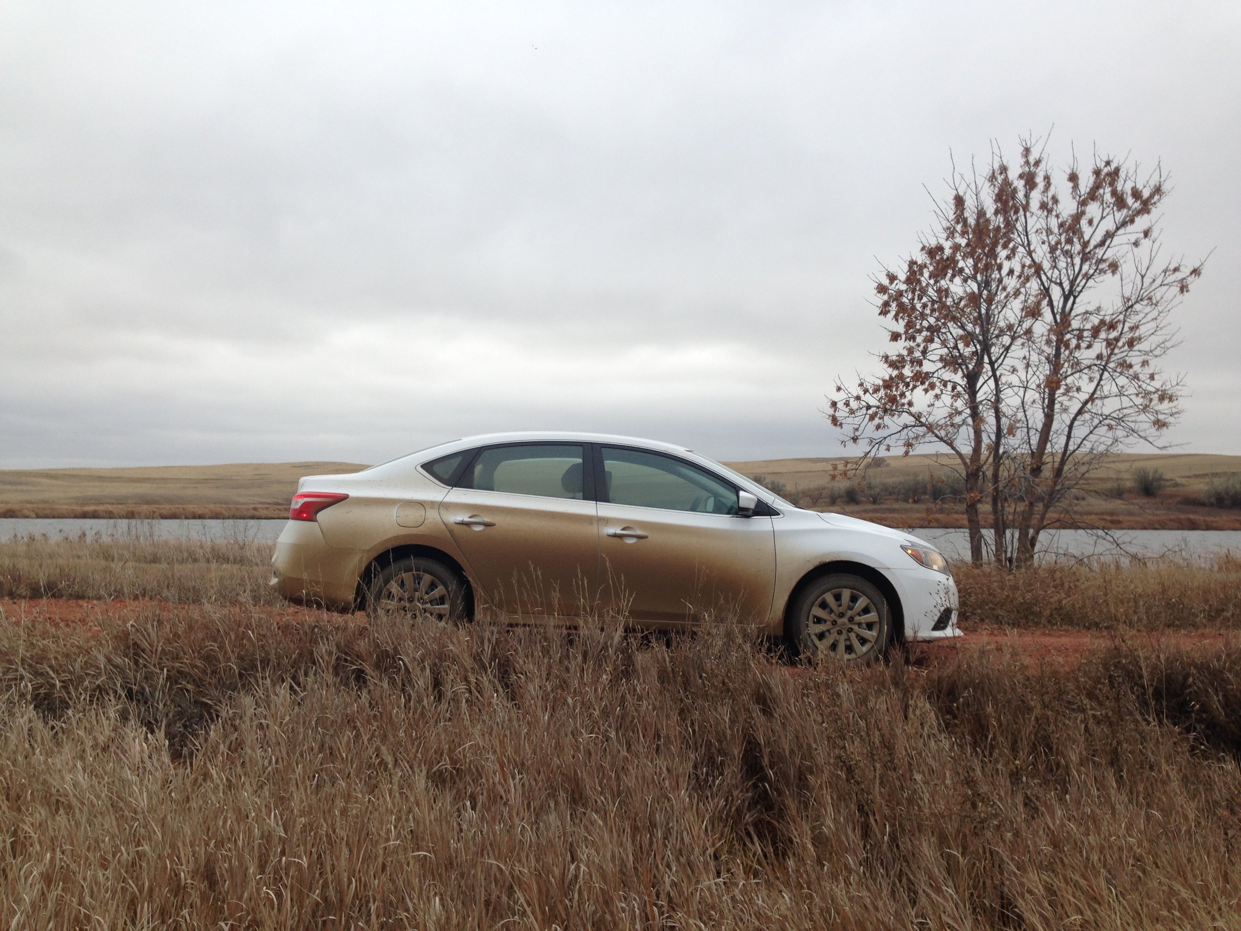  After six weeks of driving gravel roads my rental car started to blend in with the landscape!  