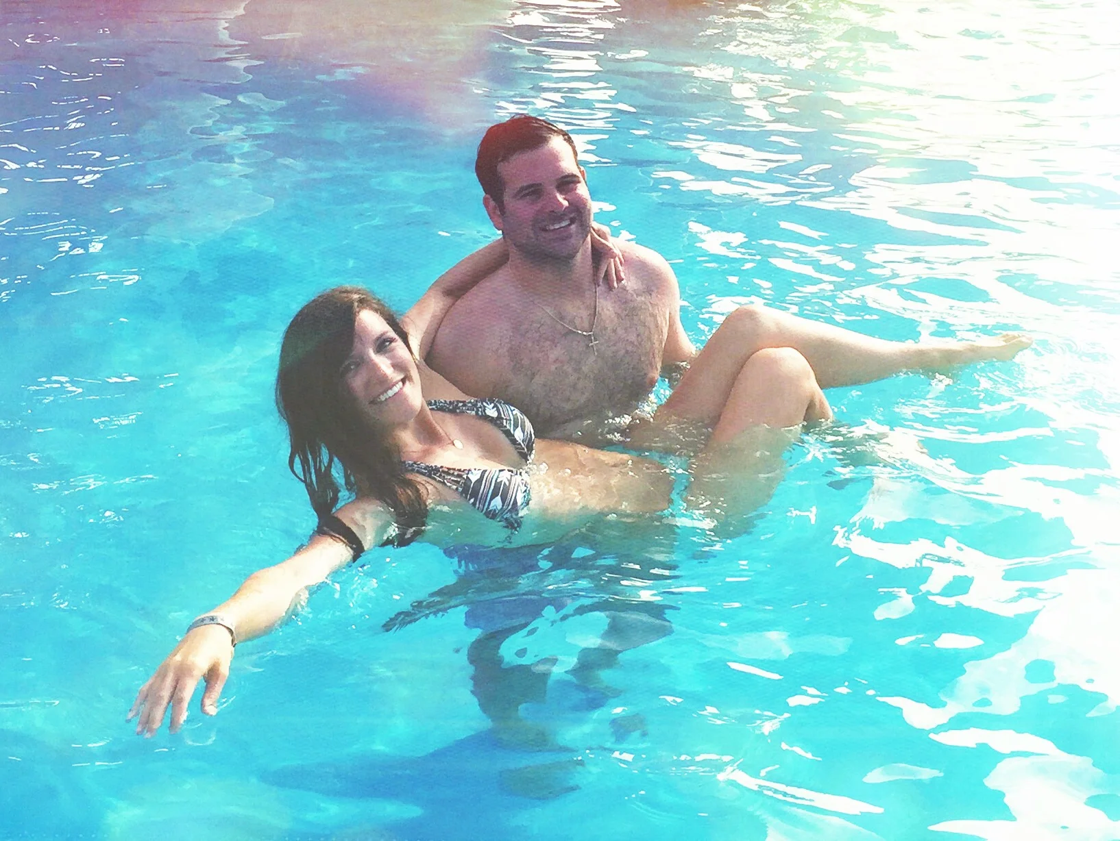 Having fun in the pool with my love!
