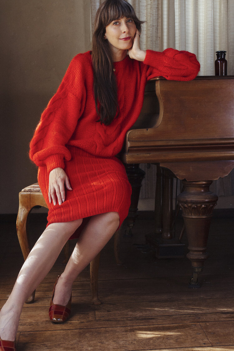 Heather wears  SOPHIA Sweater   (SHOP HERE)  +  AVA Skirt   (SHOP HERE)  in Hot Coral