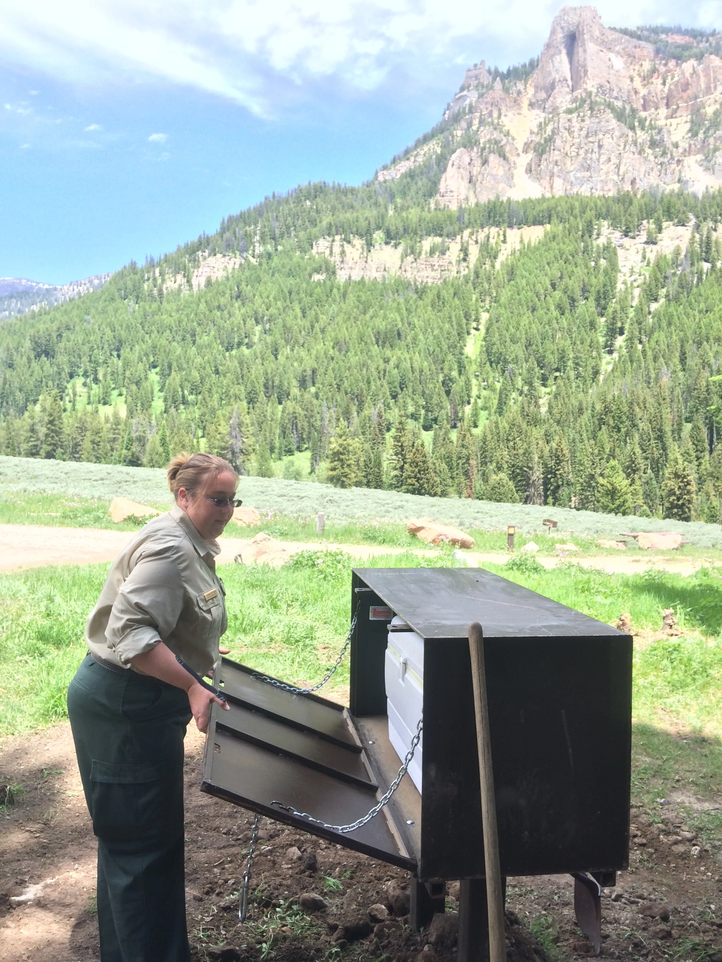 Forest Service staff with the new bear boxes at Granite Creek Campground. (Photo GYC.)
