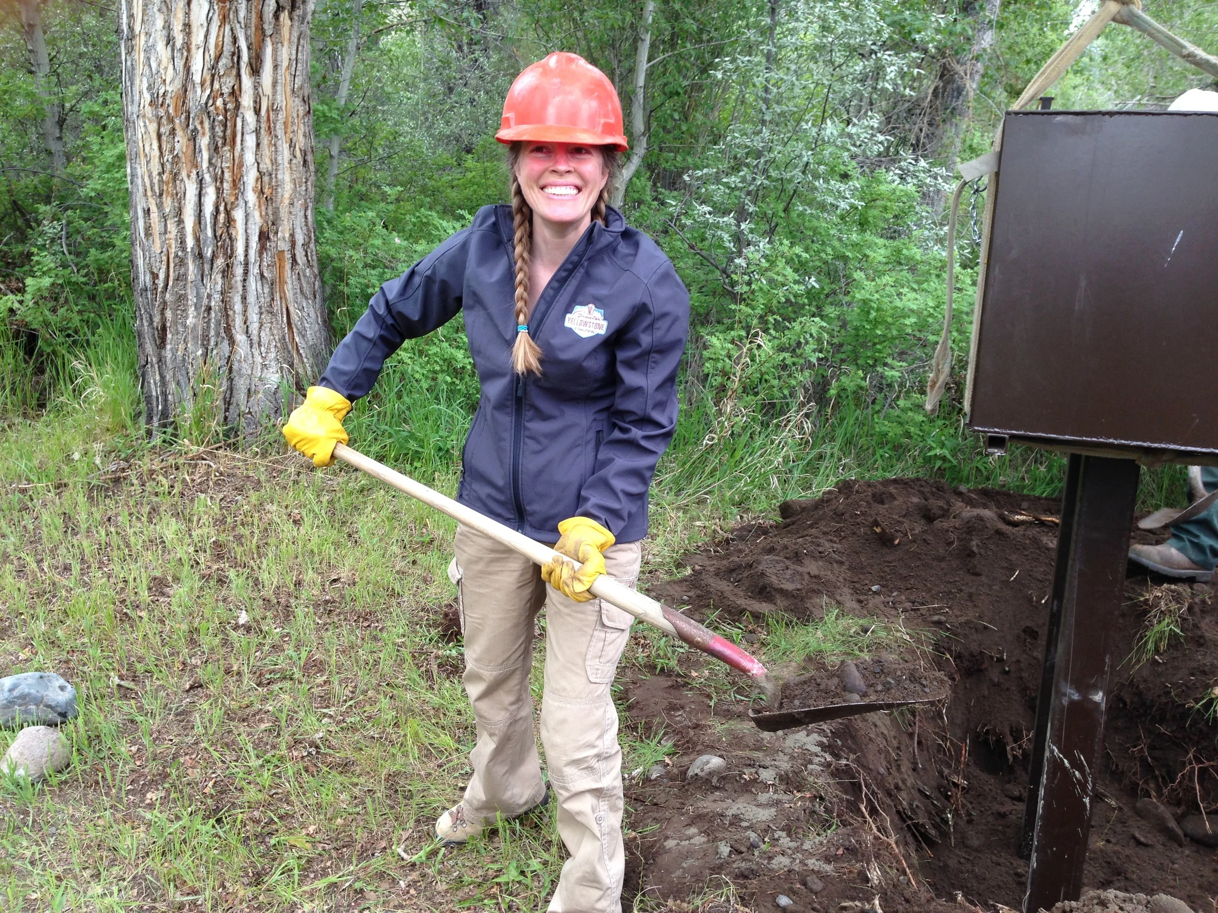 Keeping bears wild and people safe. GYC Wyoming Conservation Associate Jenny DeSarro helps install bear boxes in Wyoming's Shoshone National Forest in 2015. (Photo GYC.)