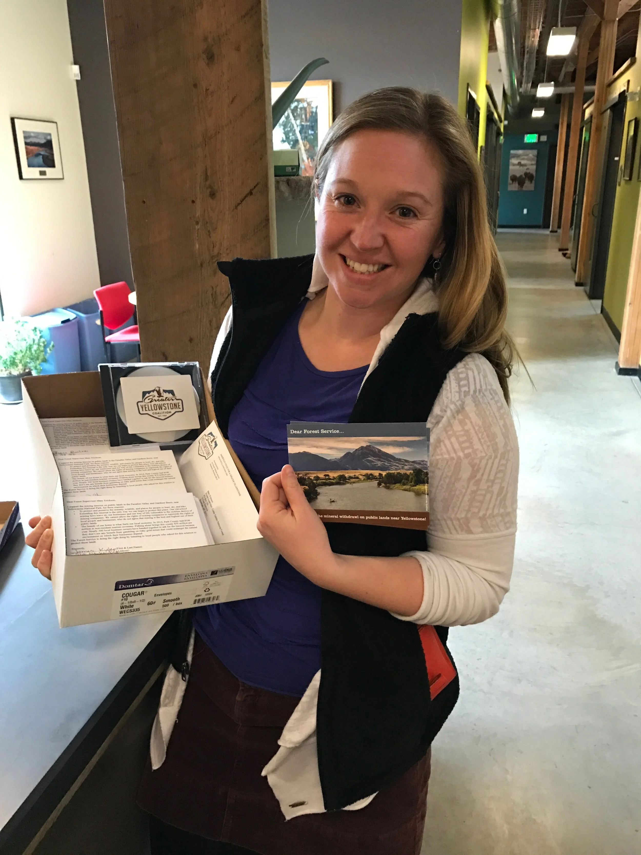 GYC's Liz Purdy heads out to deliver your comment to the Forest Service last week! (Photo GYC.)