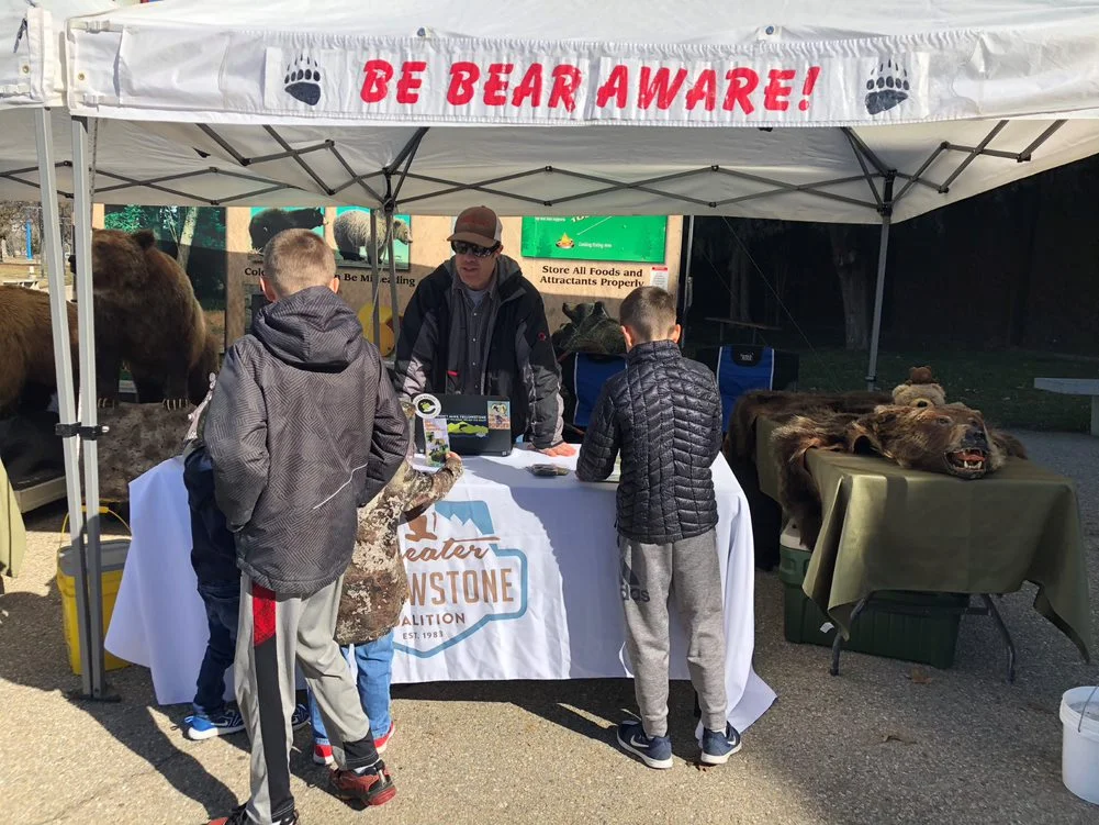 Greater Yellowstone Coalition’s Mac Dukart educating on bear awareness and safety at the Idaho Sportsman Show. (Photo GYC.)